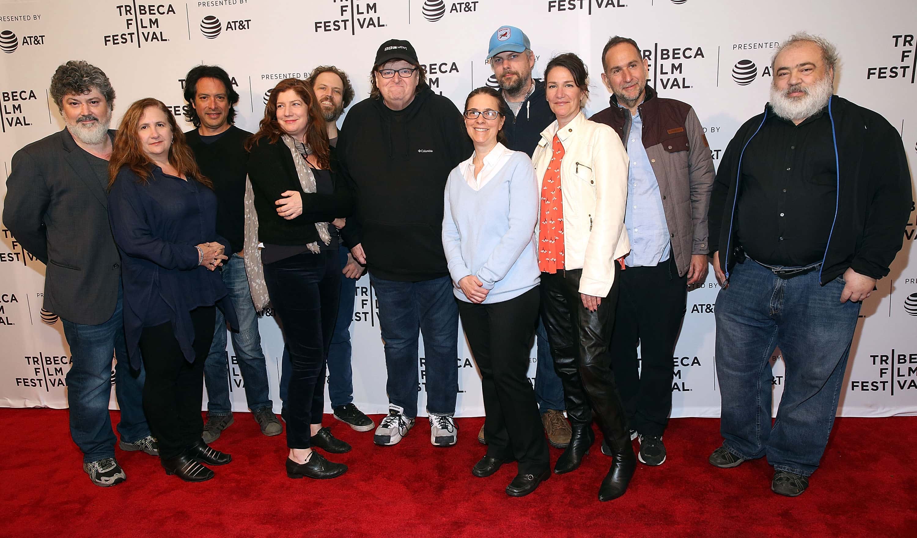 Filmmaker Michael Moore (C) with cast and crew attend 
