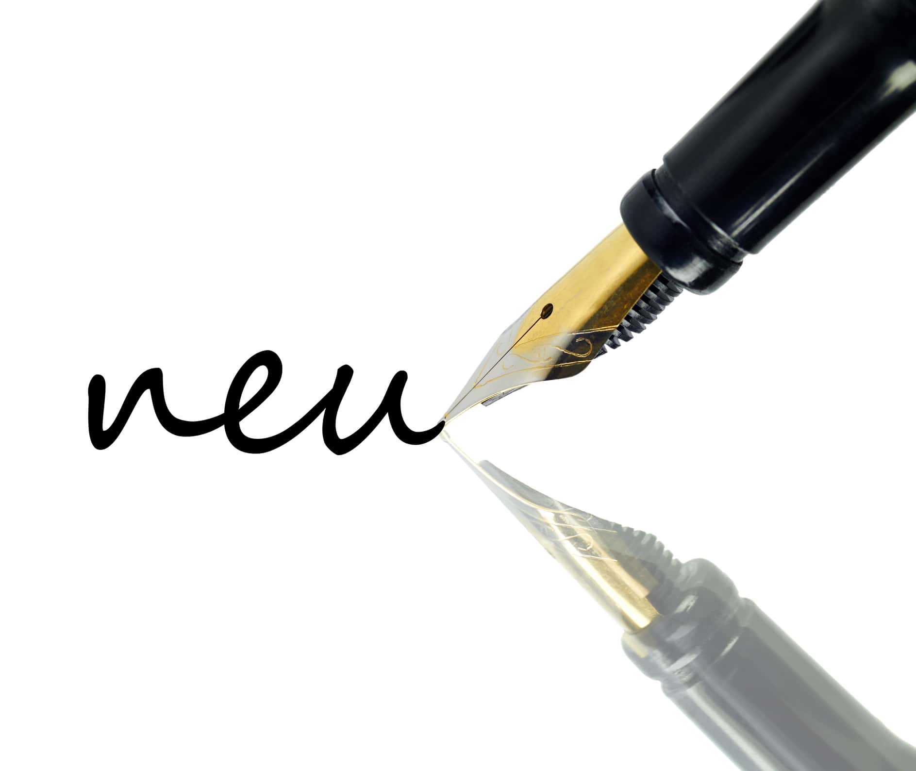 Close-Up Of Pen With Word New On White Background.