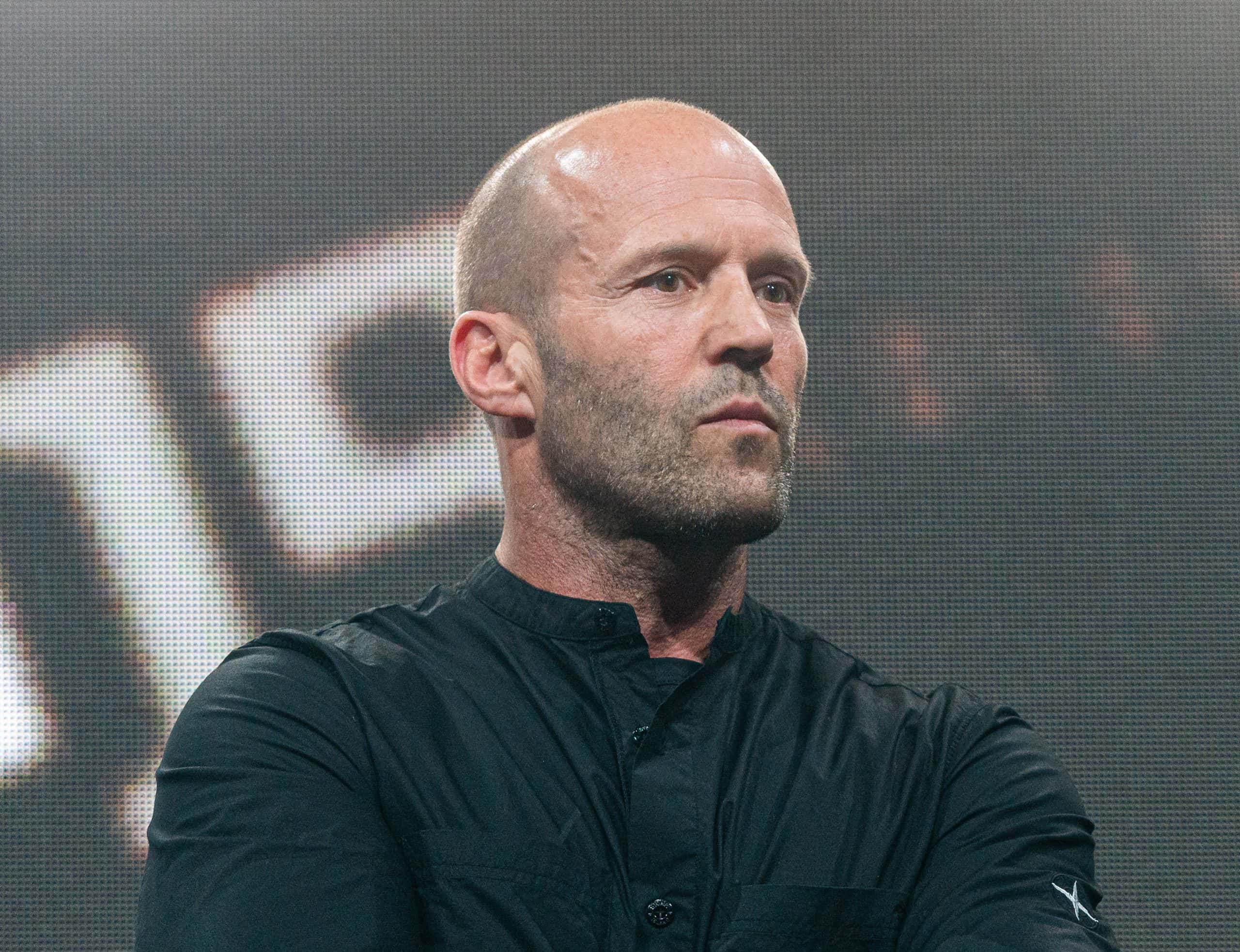 Jason Statham wearing black shirt at the world premiere