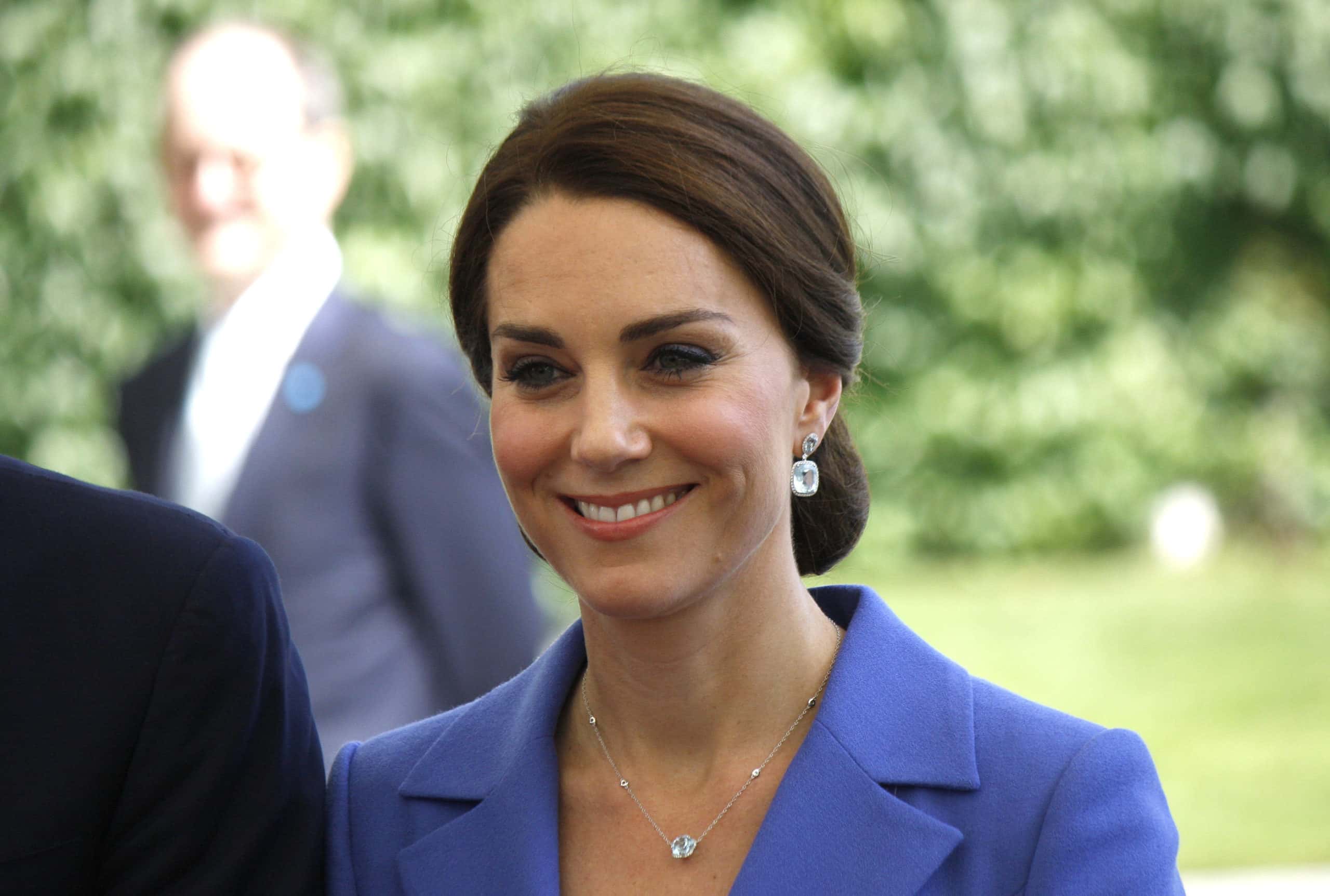 Kate Middleton wearing a purple top