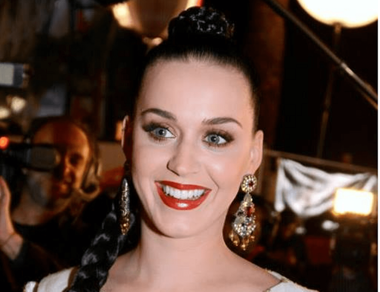 Katy Perry in a white floral dress