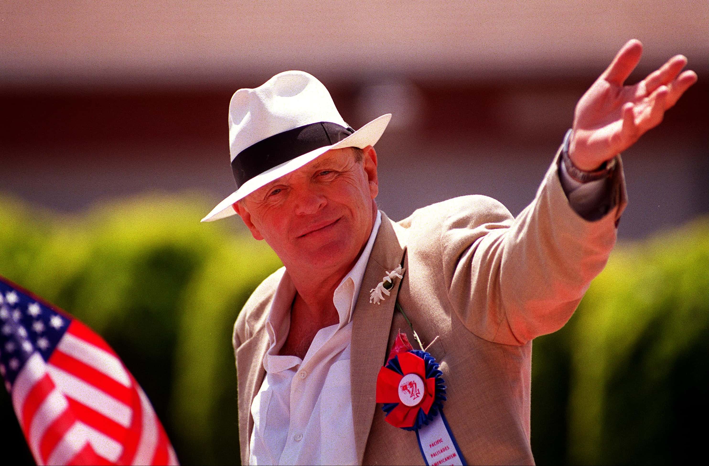 Actor Sir Anthony Hopkins waves to the crowd