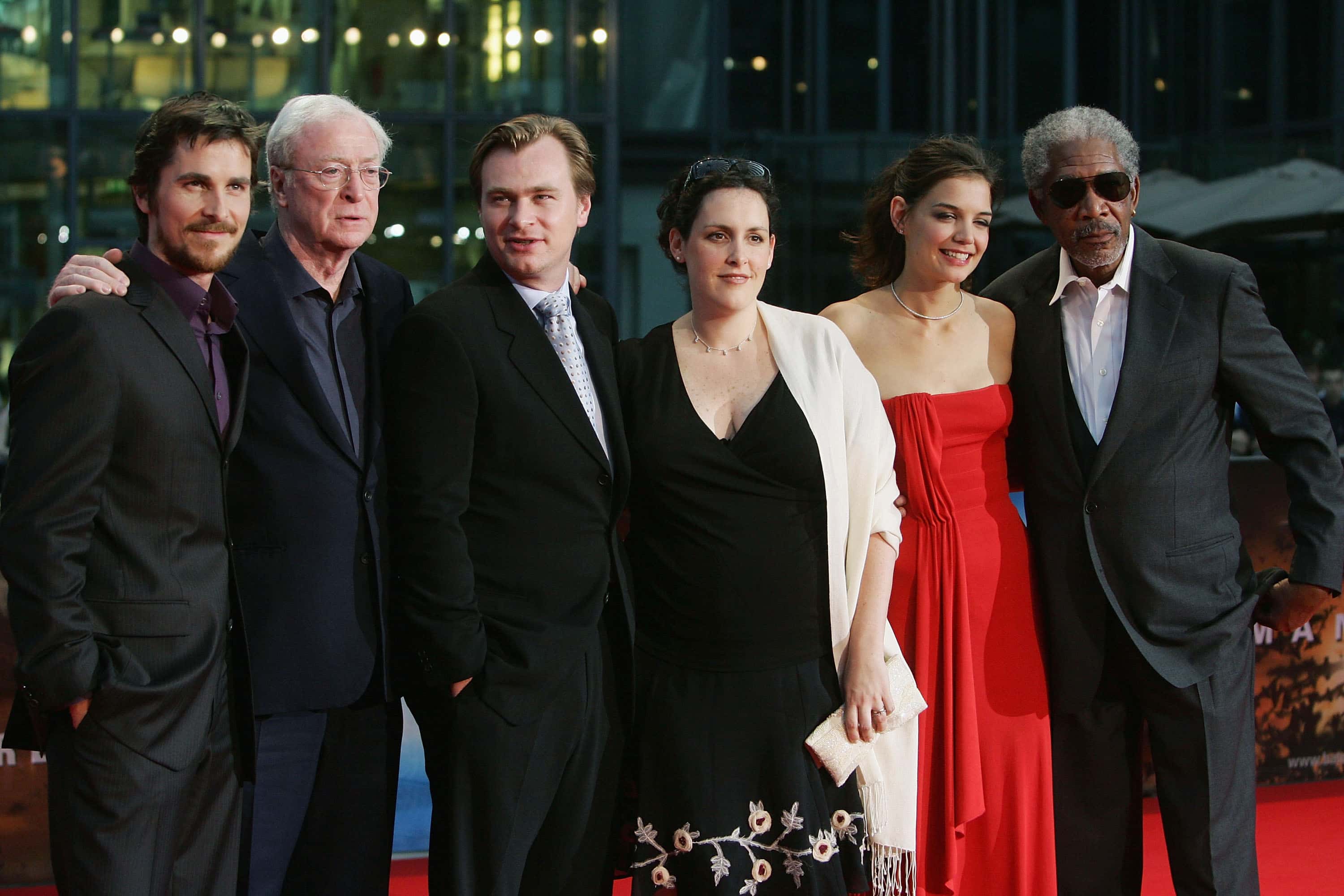 Actor Christian Bale, actor Michael Caine, director Christopher Nolan, producer Emma Thomas, actress Katie Holmes and actor Morgan Freeman arrive for the German premiere of