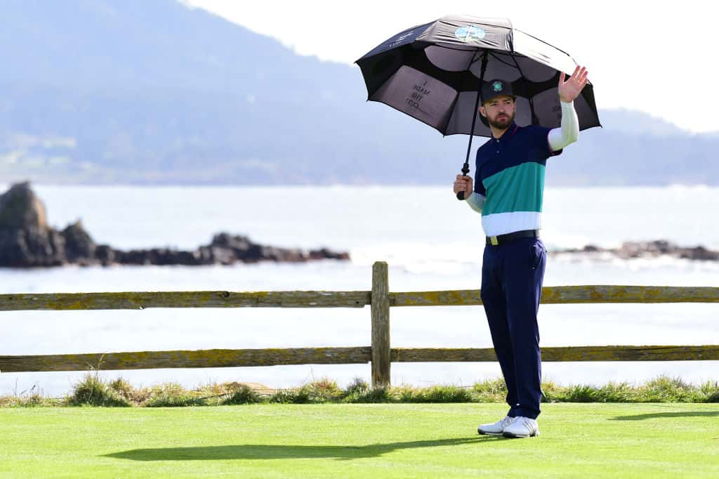 Justin Timberlake waves to the crowd  at Pebble Beach Golf Links