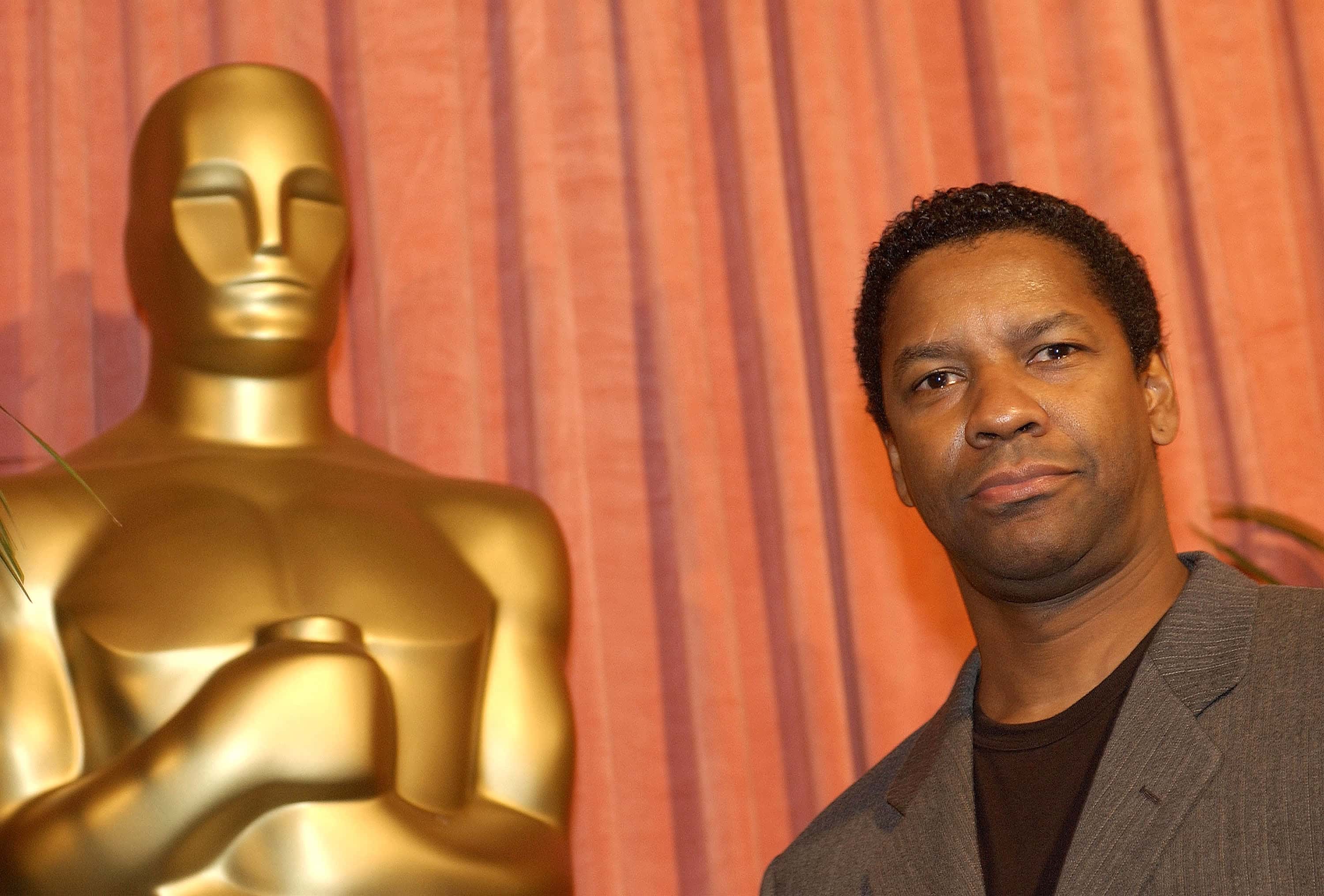 Actor Denzel Washington attends the nominees luncheon