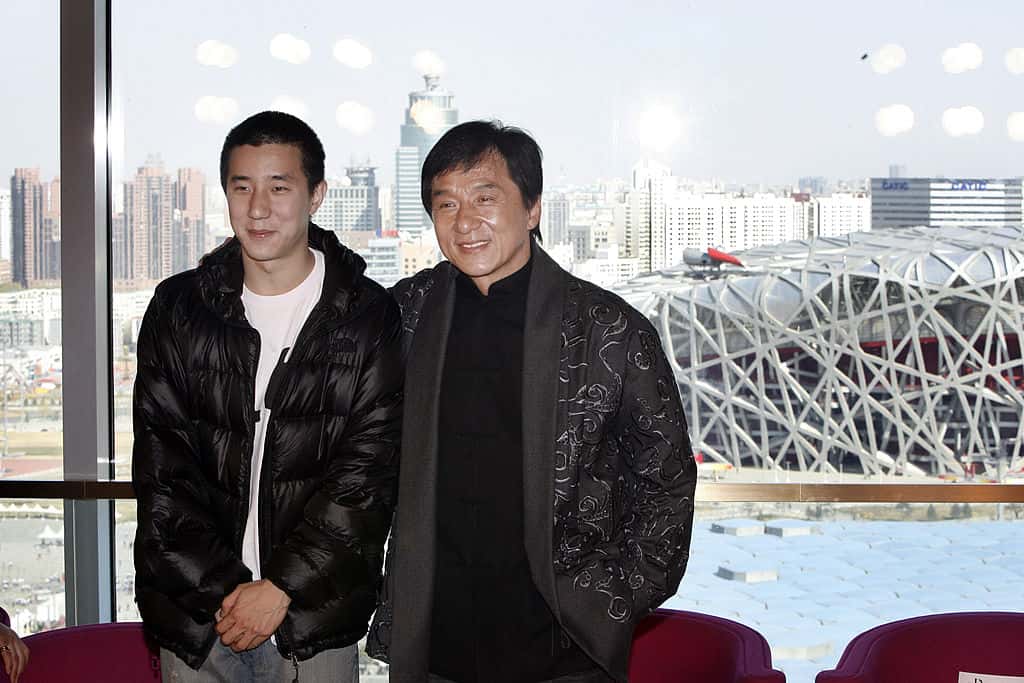 Jackie Chan and his son Jaycee Chan attend a press conference announcing a concert at the Bird's Nest Stadium