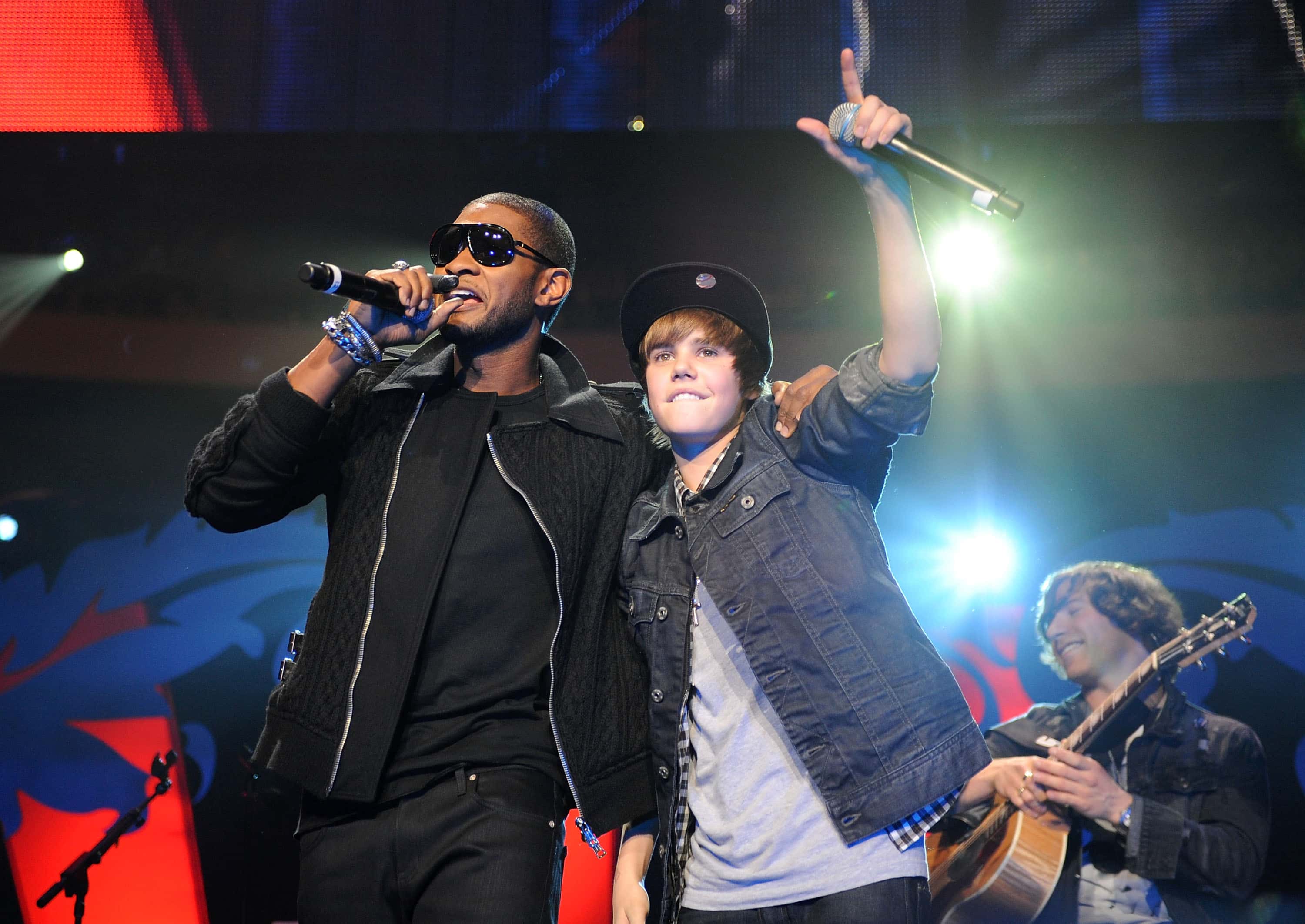 Usher and Justin Bieber perform onstage during Z100's Jingle Ball
