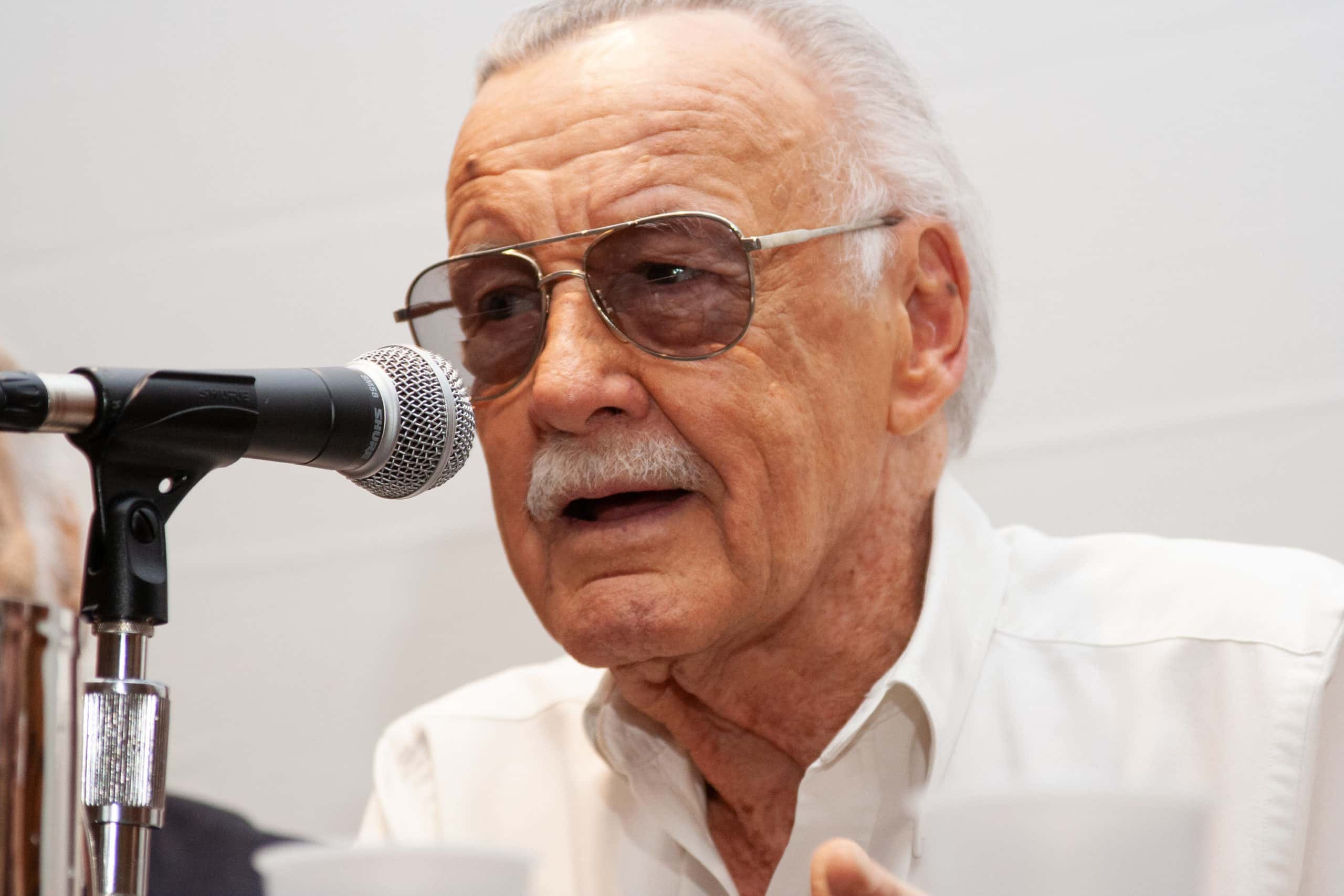 Stan Lee wearing a white shirt
