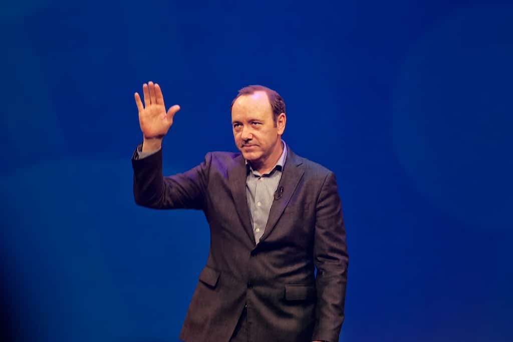Portrait Photo of the actor Kevin Spacey in a dark gray suit