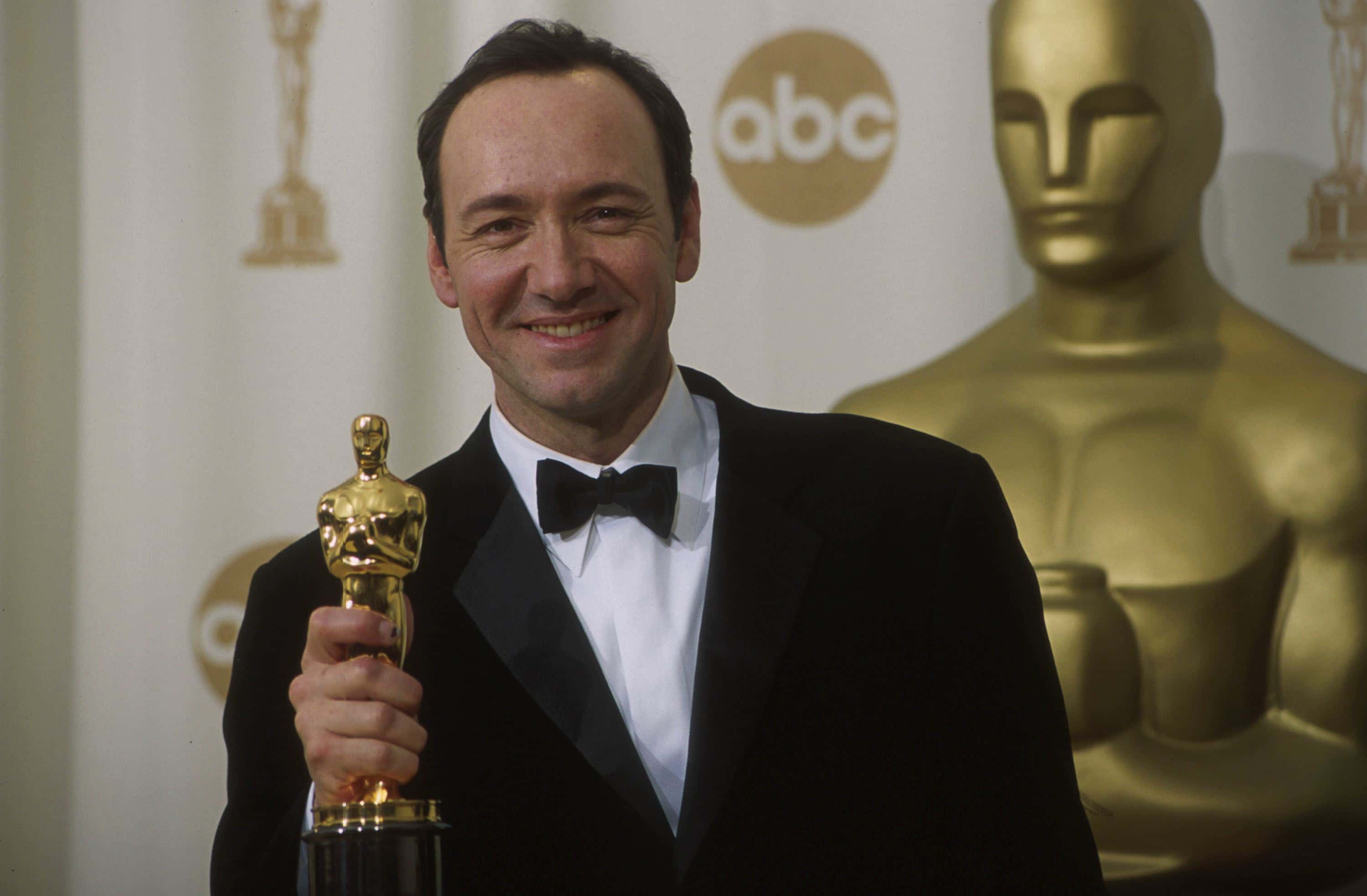 Kevin Spacey holds his Oscar for Best Actor for his role in American Beauty