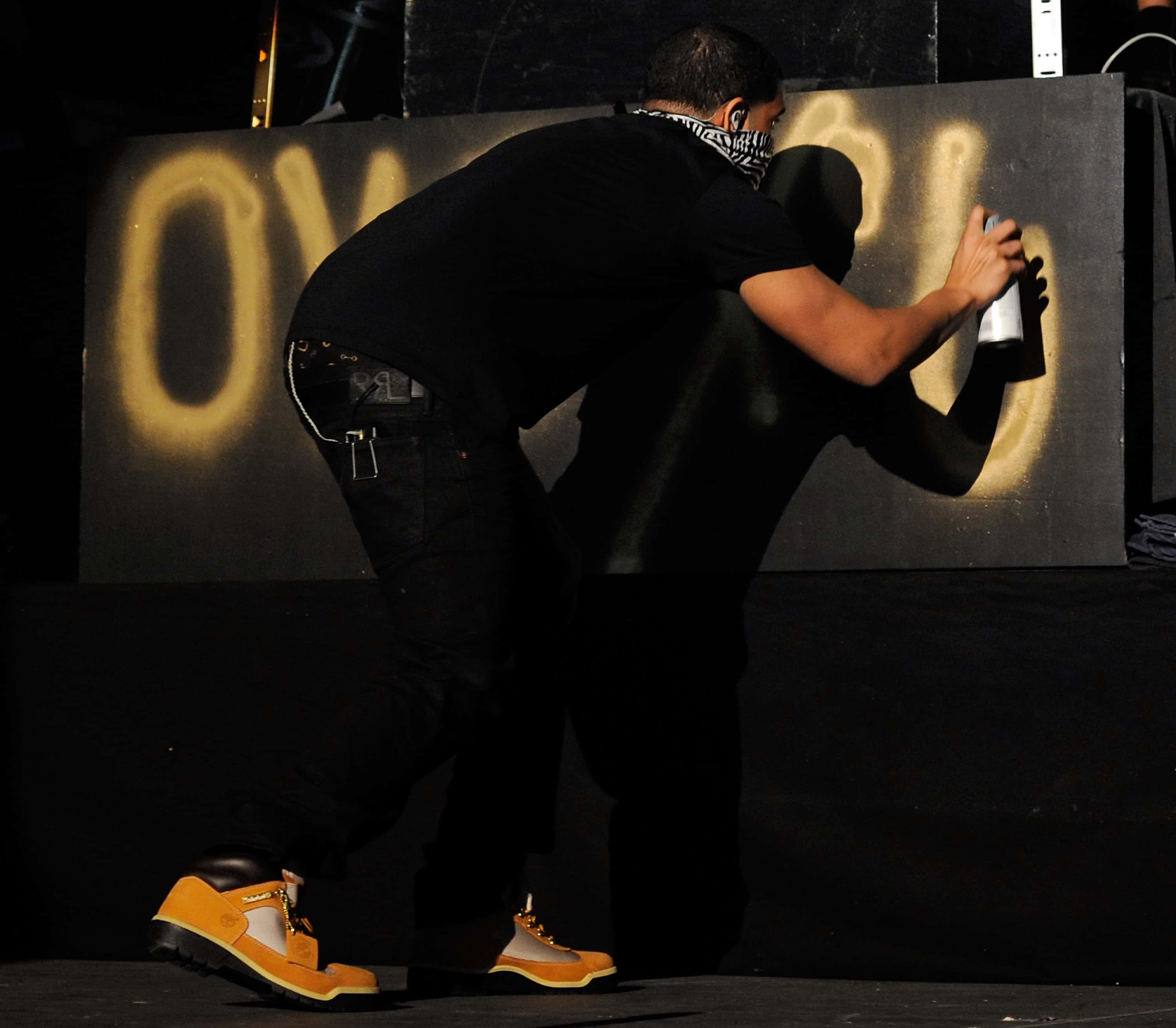 Recording artist Drake spray paints