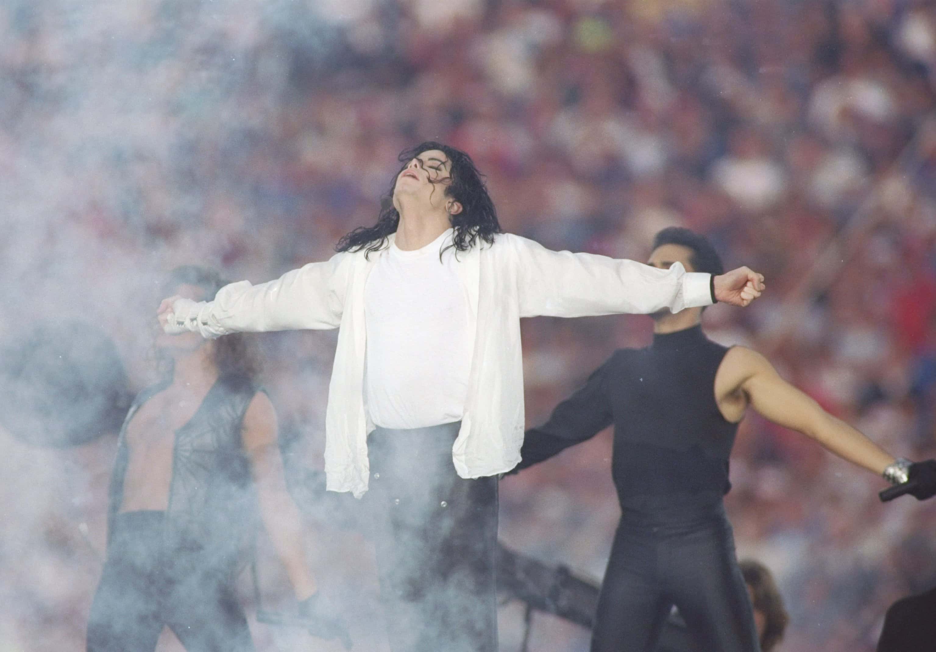 Entertainer Michael Jackson sings at half-time during the Super Bowl X XVII game between the Buffalo Bills and the Dallas Cowboys at the Rose Bowl in Pasadena