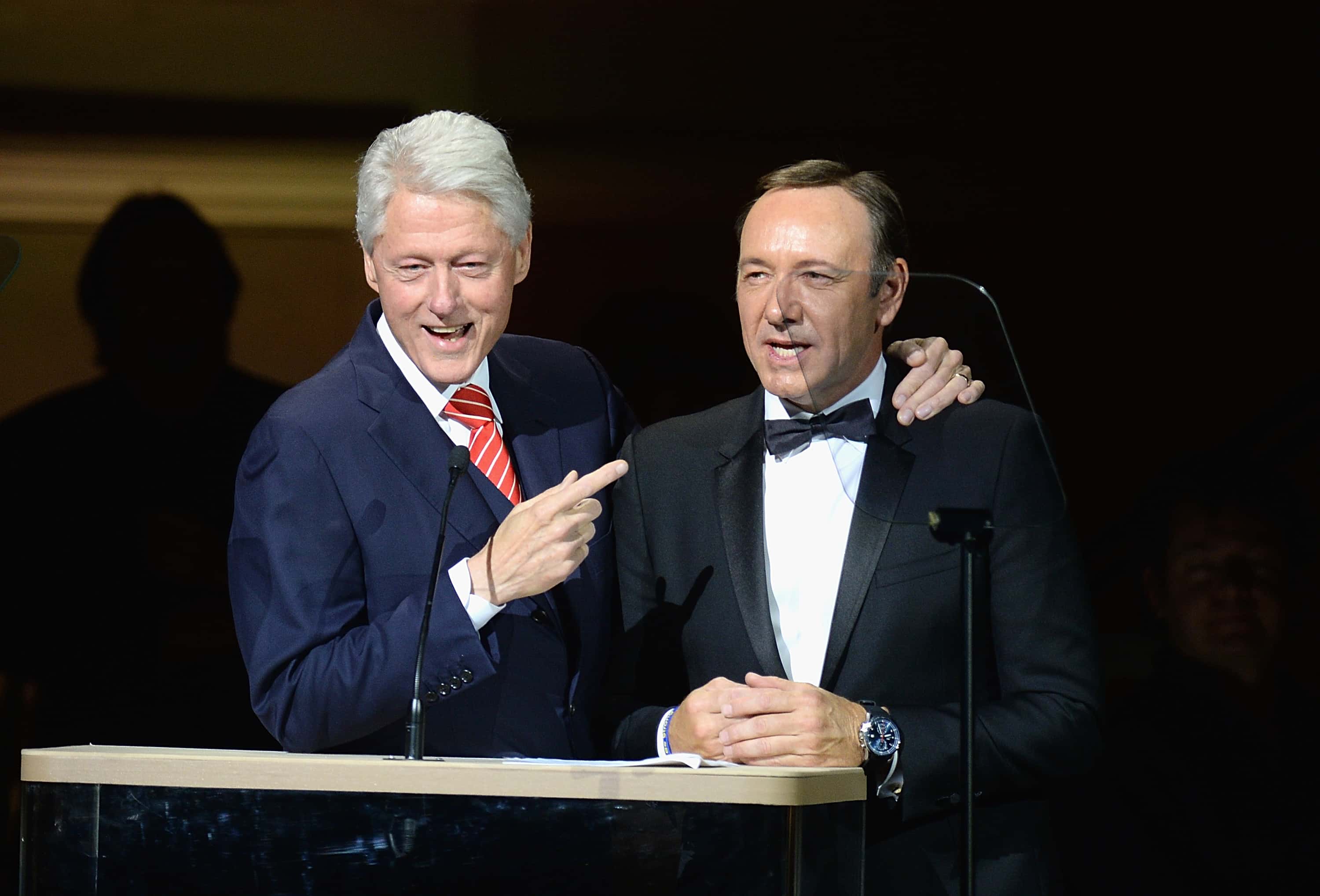 President Bill Clinton and Kevin Spacey speak during the 25th Anniversary Rainforest Fund Benefit Concert
