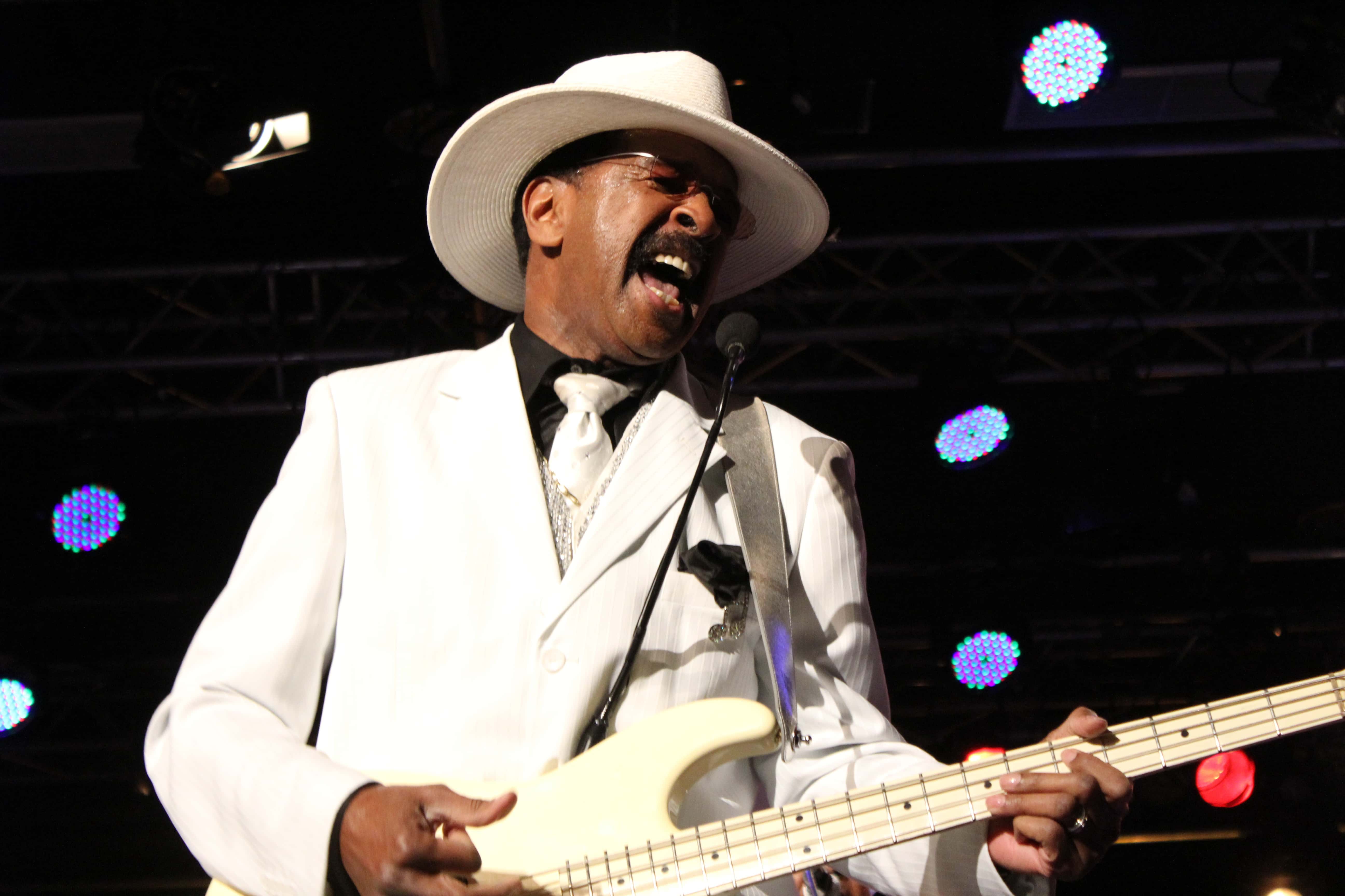 Larry Graham performing with a guitar
