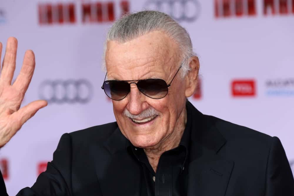 Stan Lee wearing a pair of sunglasses
