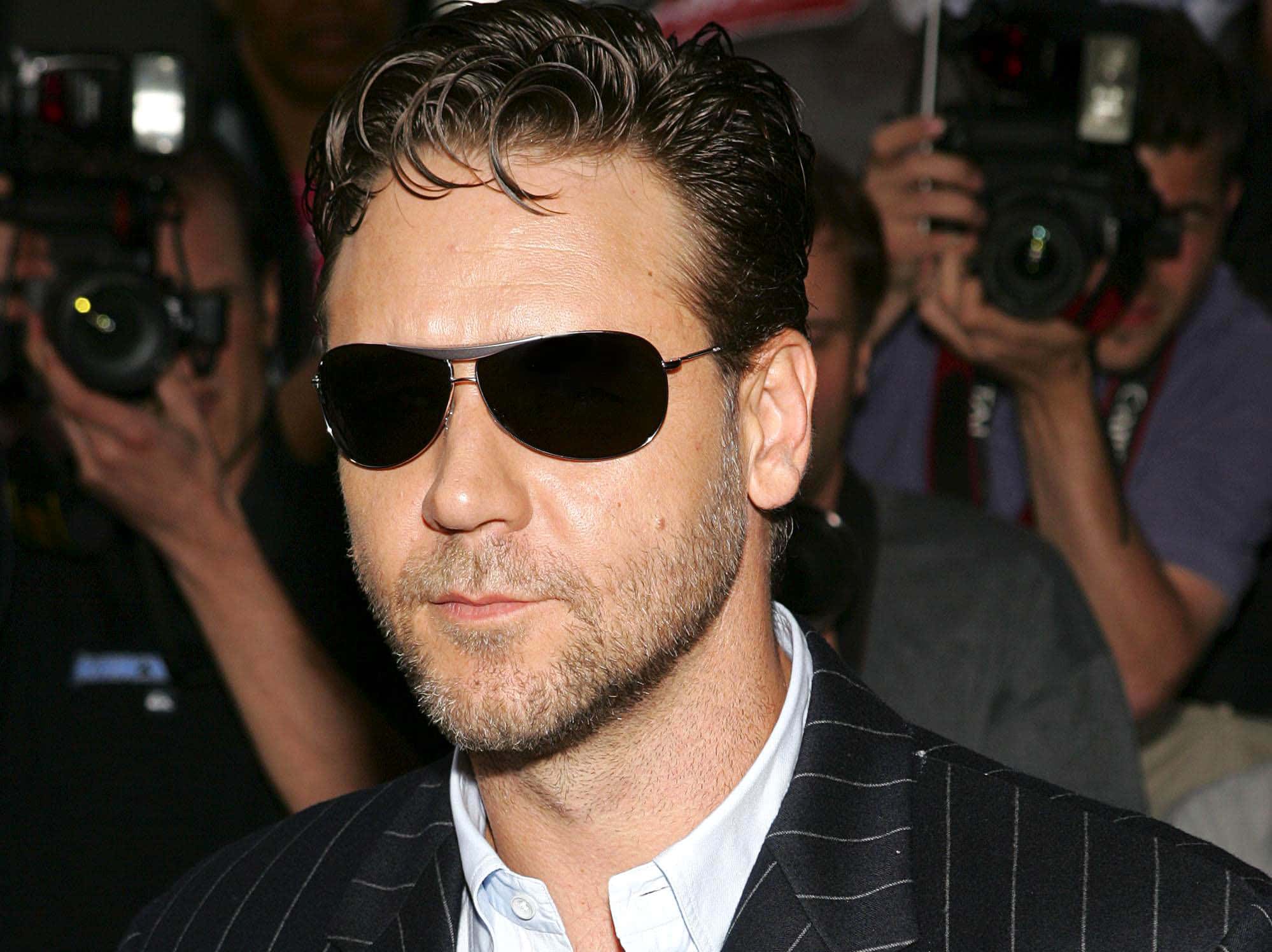 Russell Crowe wearing sunglasses