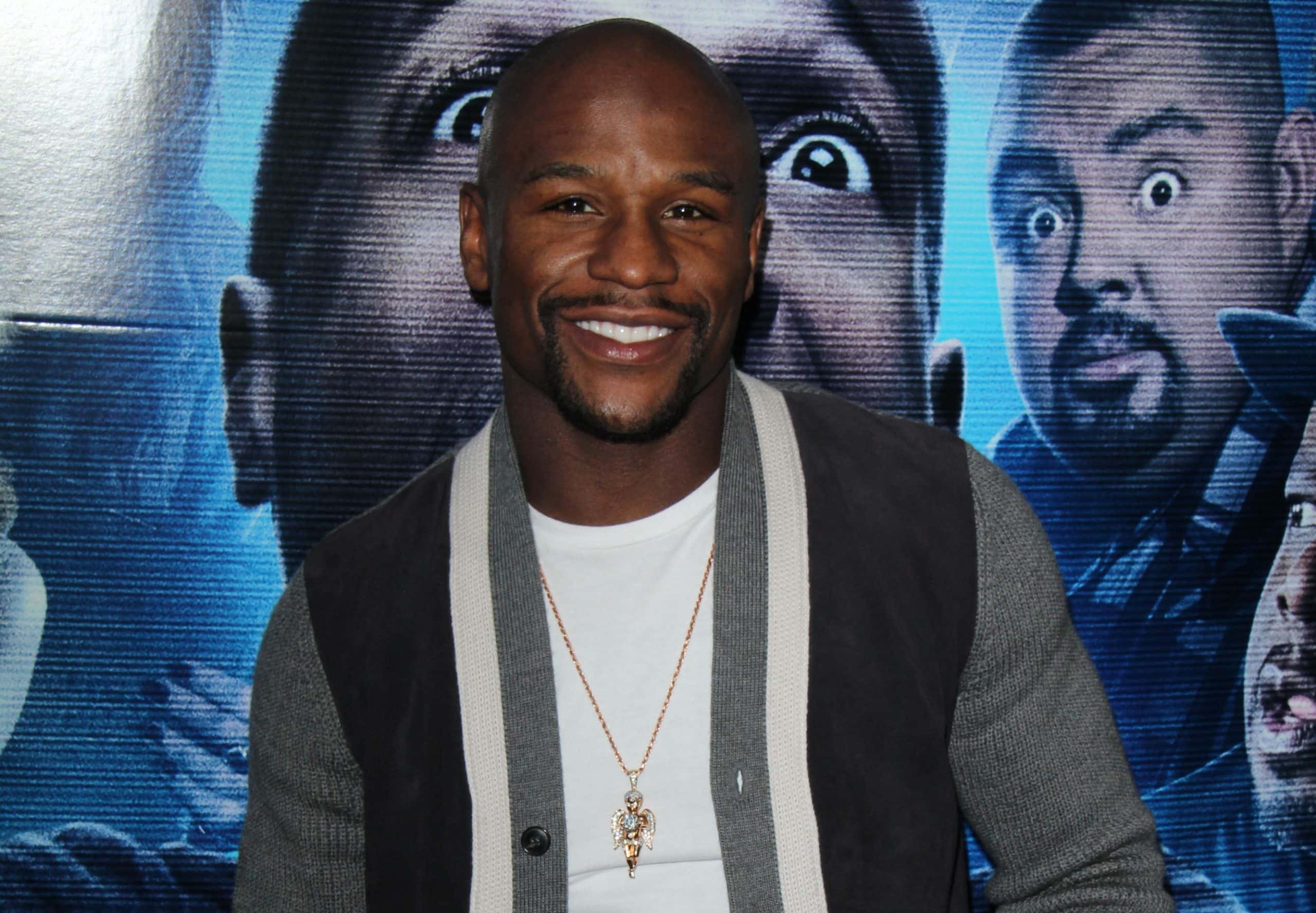 Floyd Mayweather Jr. posing for a photo