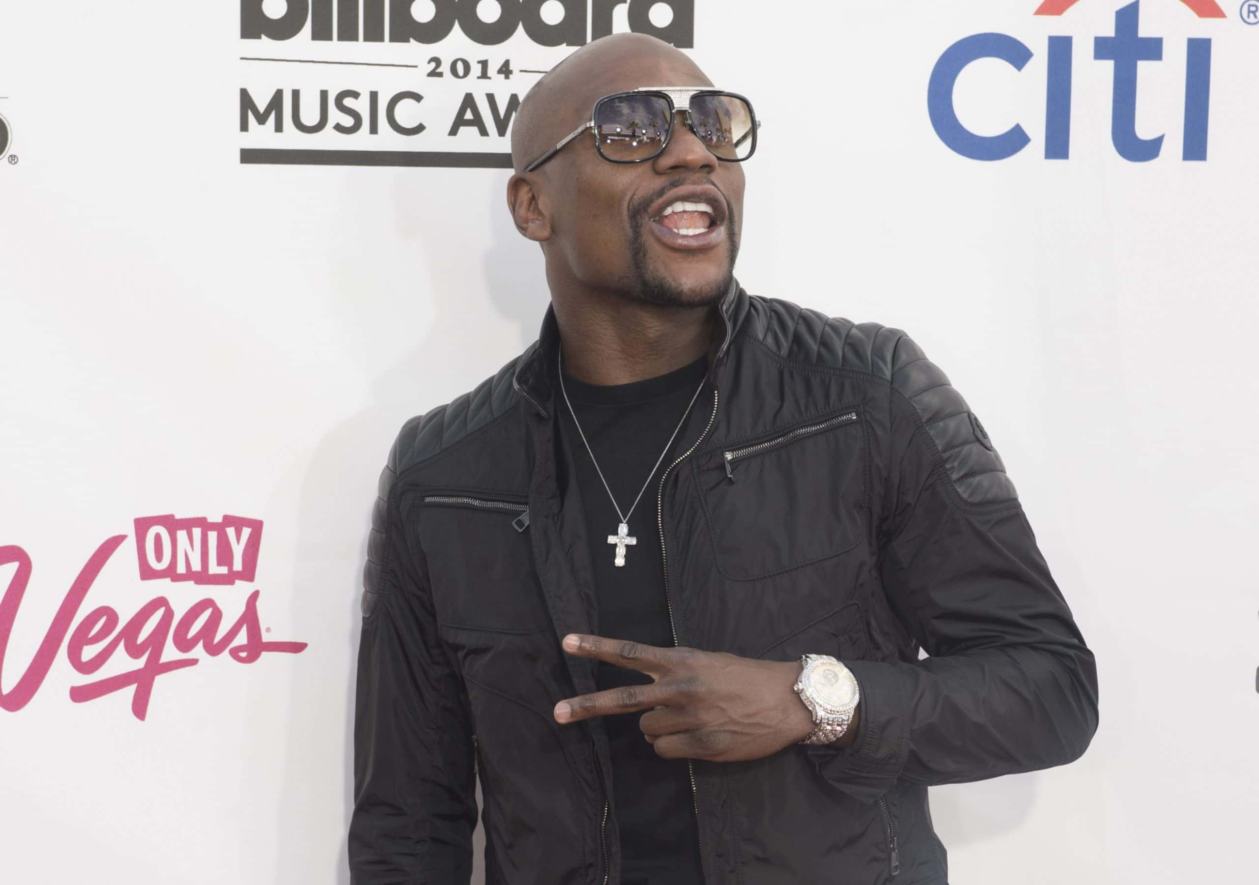 Floyd Mayweather Jr. posing for a photo