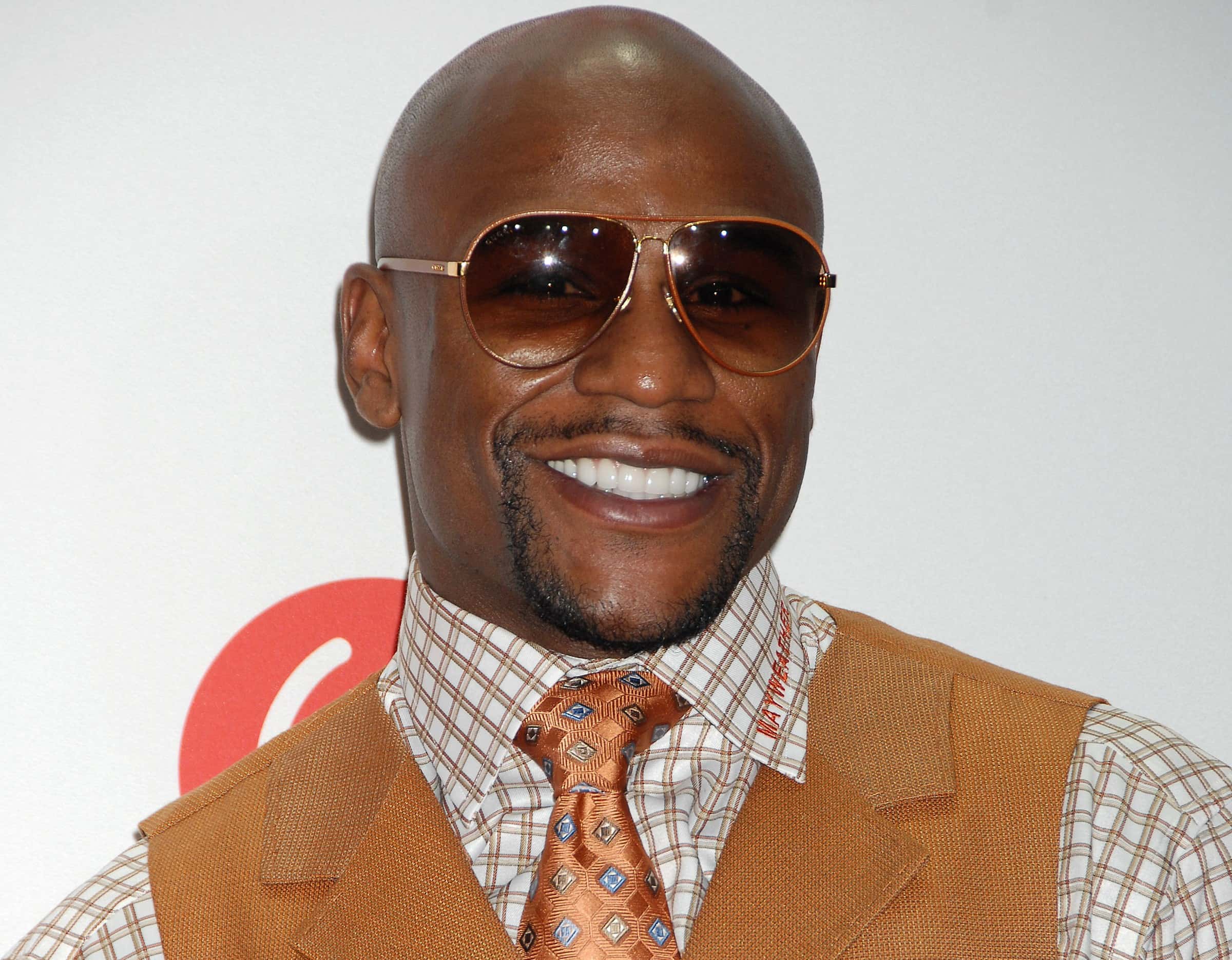 Floyd Mayweather Jr.posing for iHeartRadio