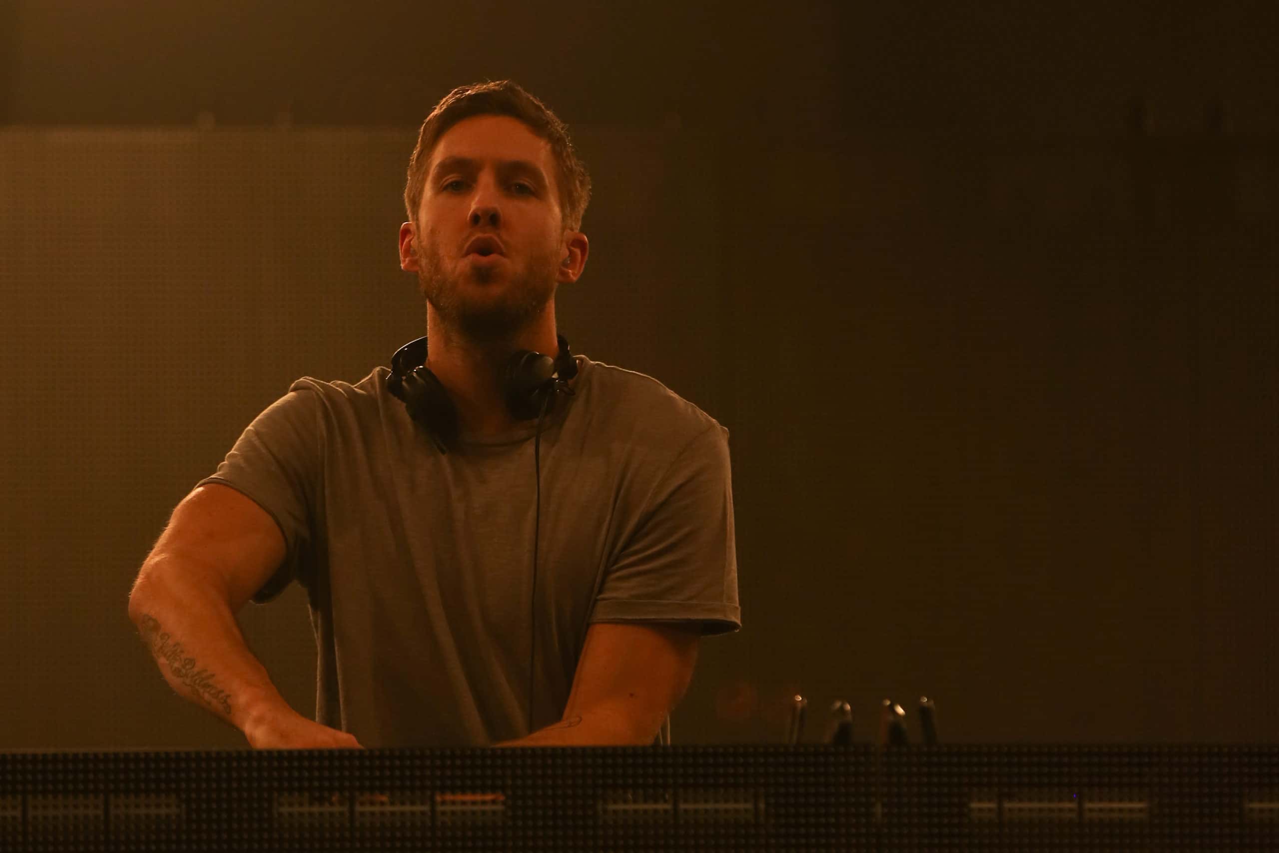 DJ Calvin Harris performs onstage during CBS RADIOs third annual We Can Survive