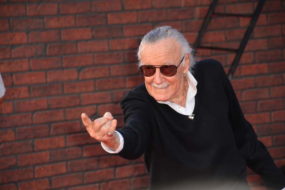 Stan Lee wearing a pair of sunglasses