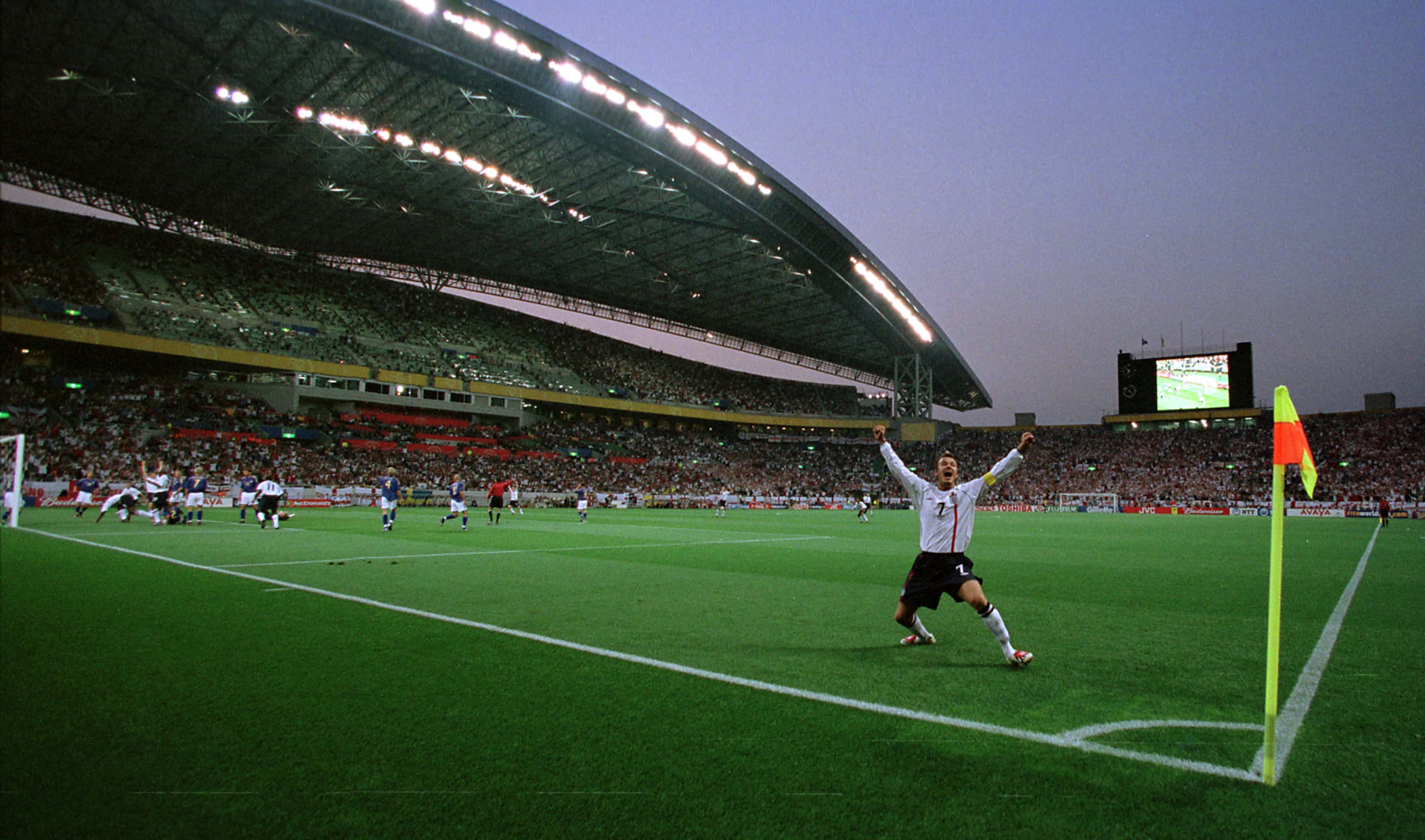 David Beckham of England celebrates after his corner led to the first goal during the England v Sweden