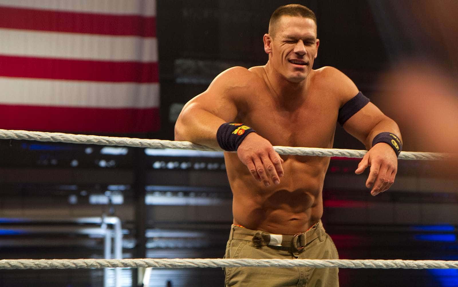 World Wrestling Entertainment talent John Cena winks at a crowd