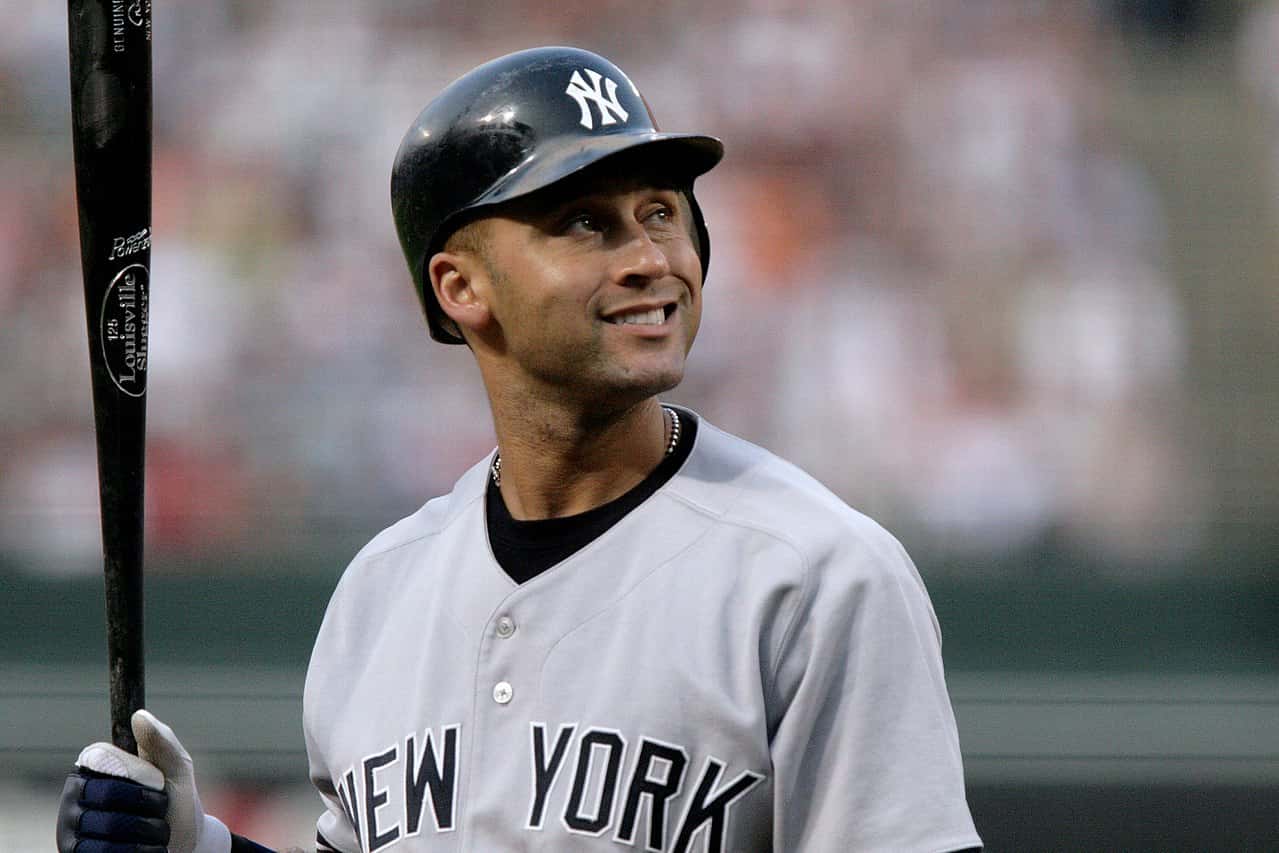 Baseball player Derek Jeter holding a baseball bat