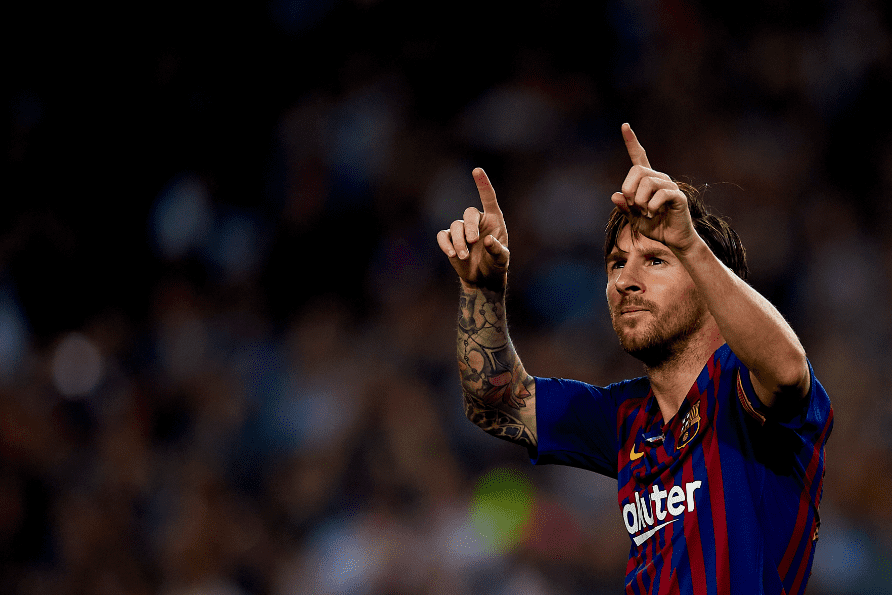 Lionel Messi celebrates after scoring his sides first goal