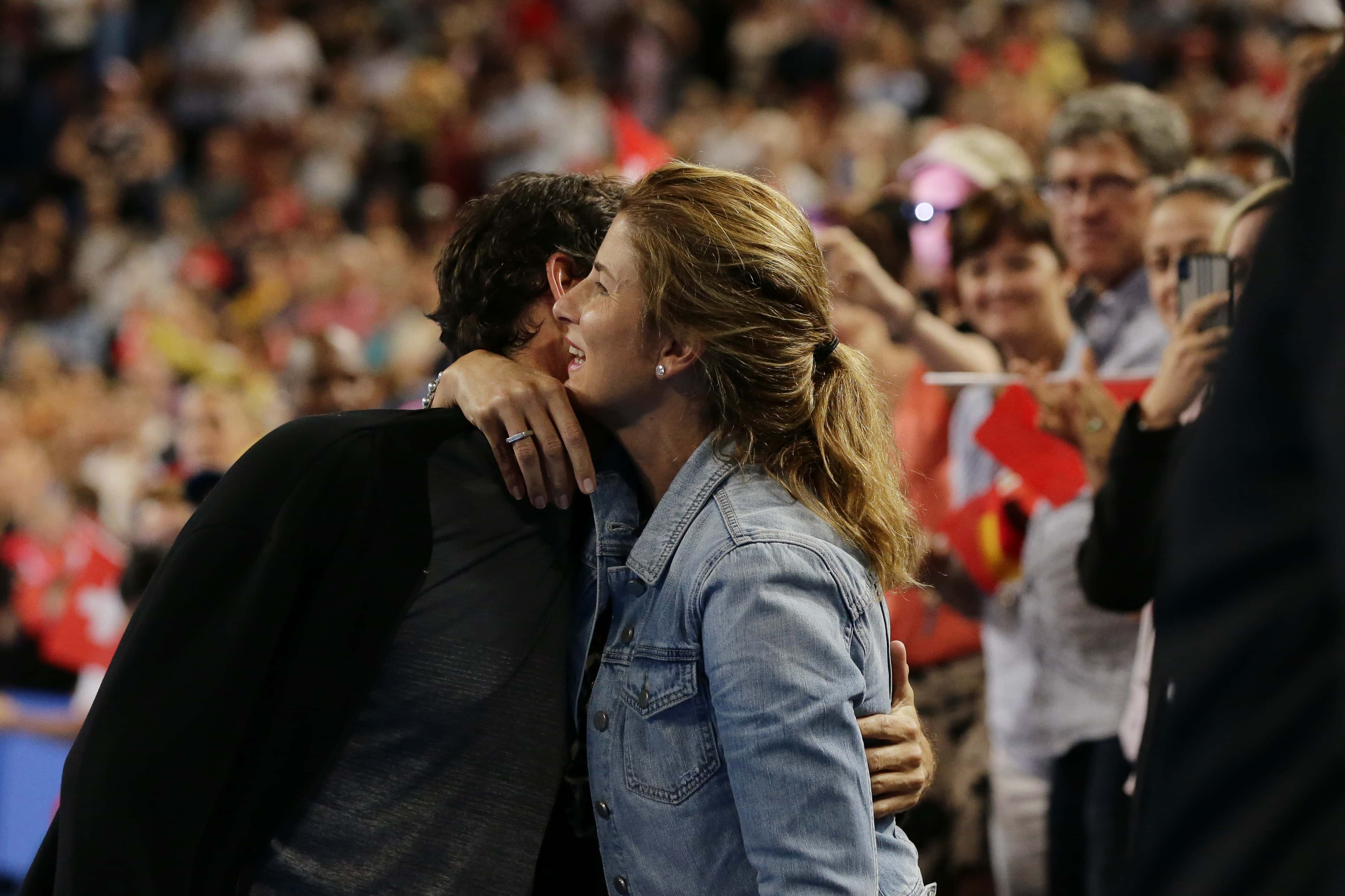Roger Federer of Switzerland embraces his wife Mirka Federer