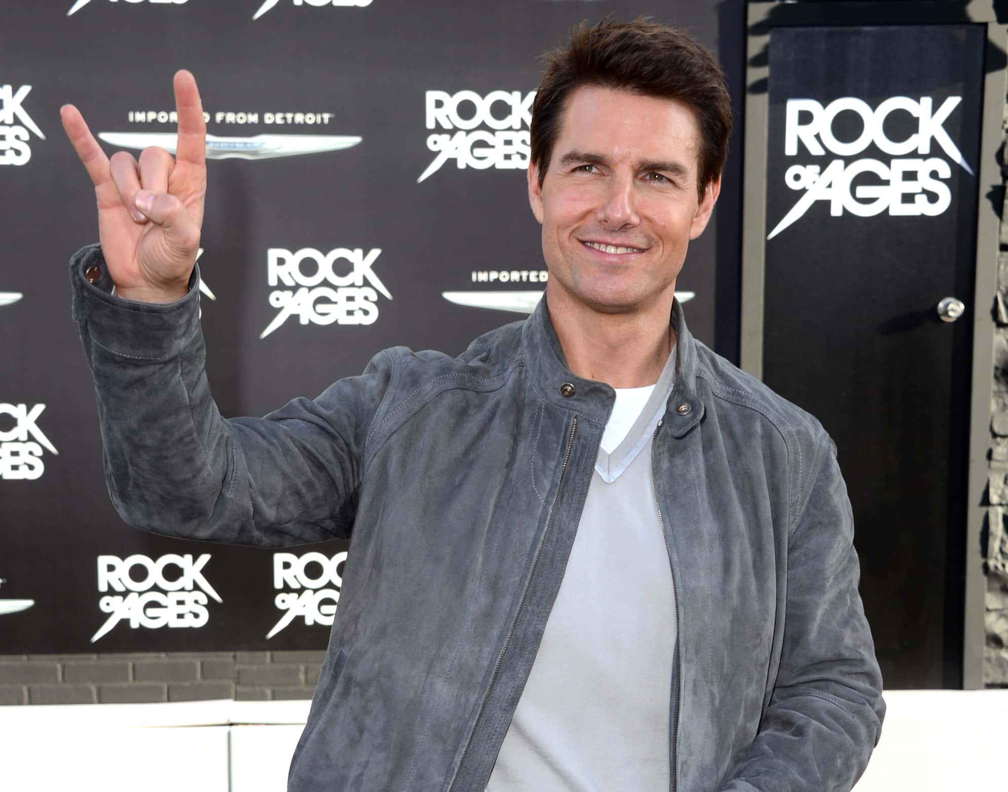 Actor Tom Cruise arrives at the premiere of Warner Bros. Pictures' 'Rock of Ages'