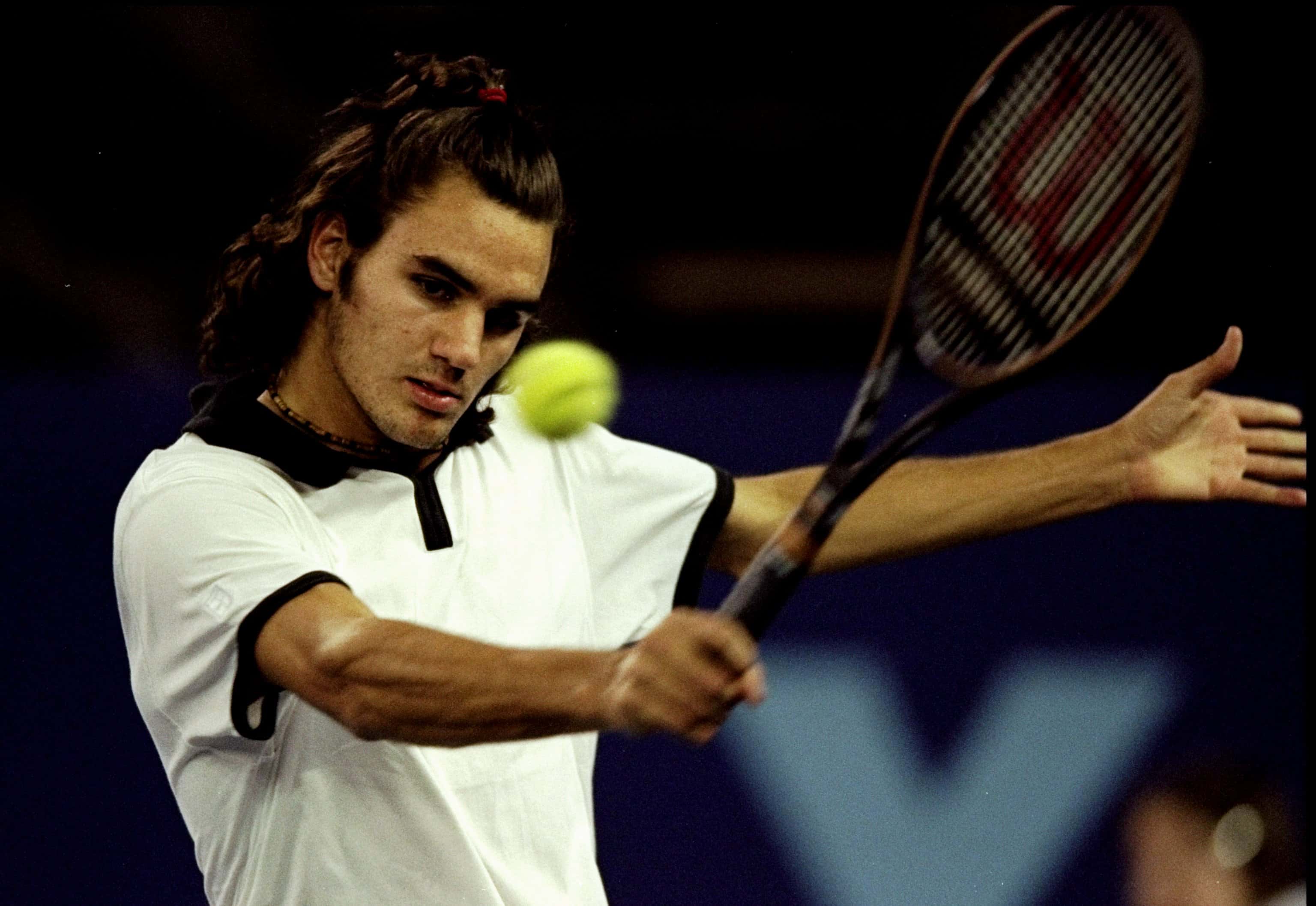  Roger Federer of Switzerland plays a backhand during the AXA Cup 2000