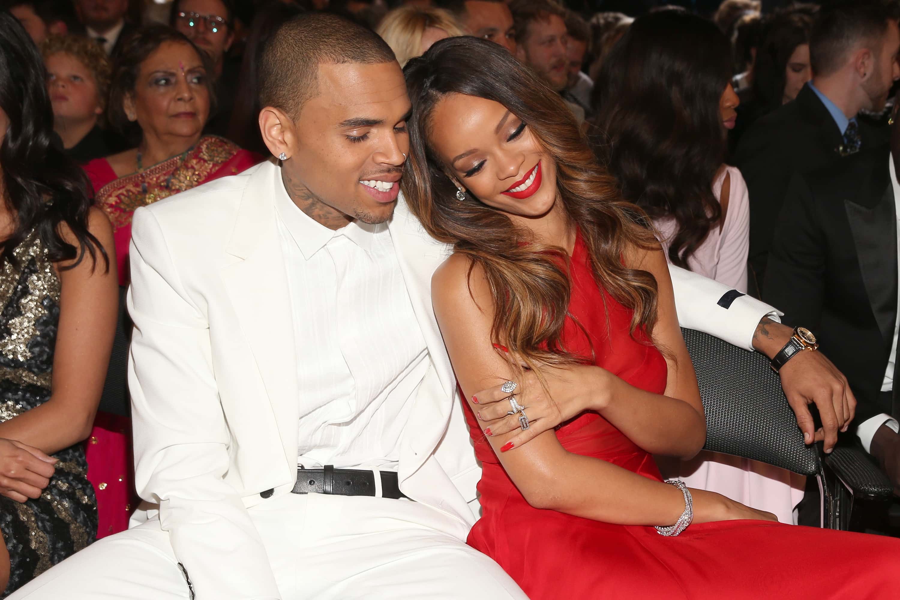 Chris Brown (L) and Rihanna attend the 55th Annual GRAMMY Awards 