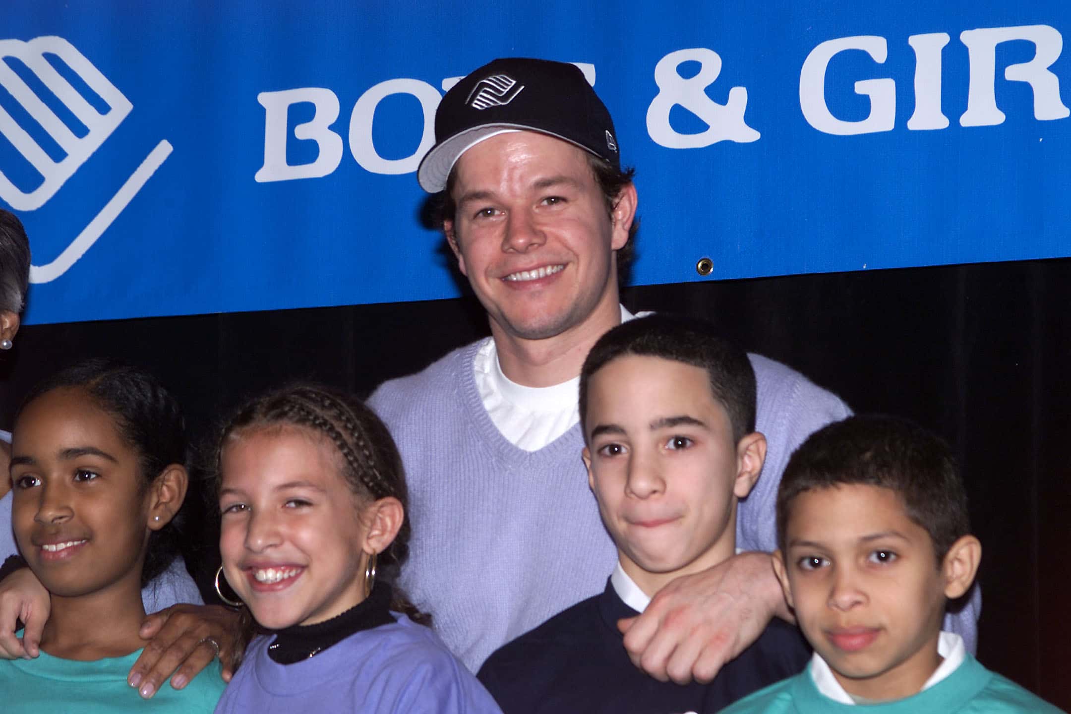 Mark Wahlberg with members of the Boys & Girls Club at the launch of "Campaign 3 P.M."