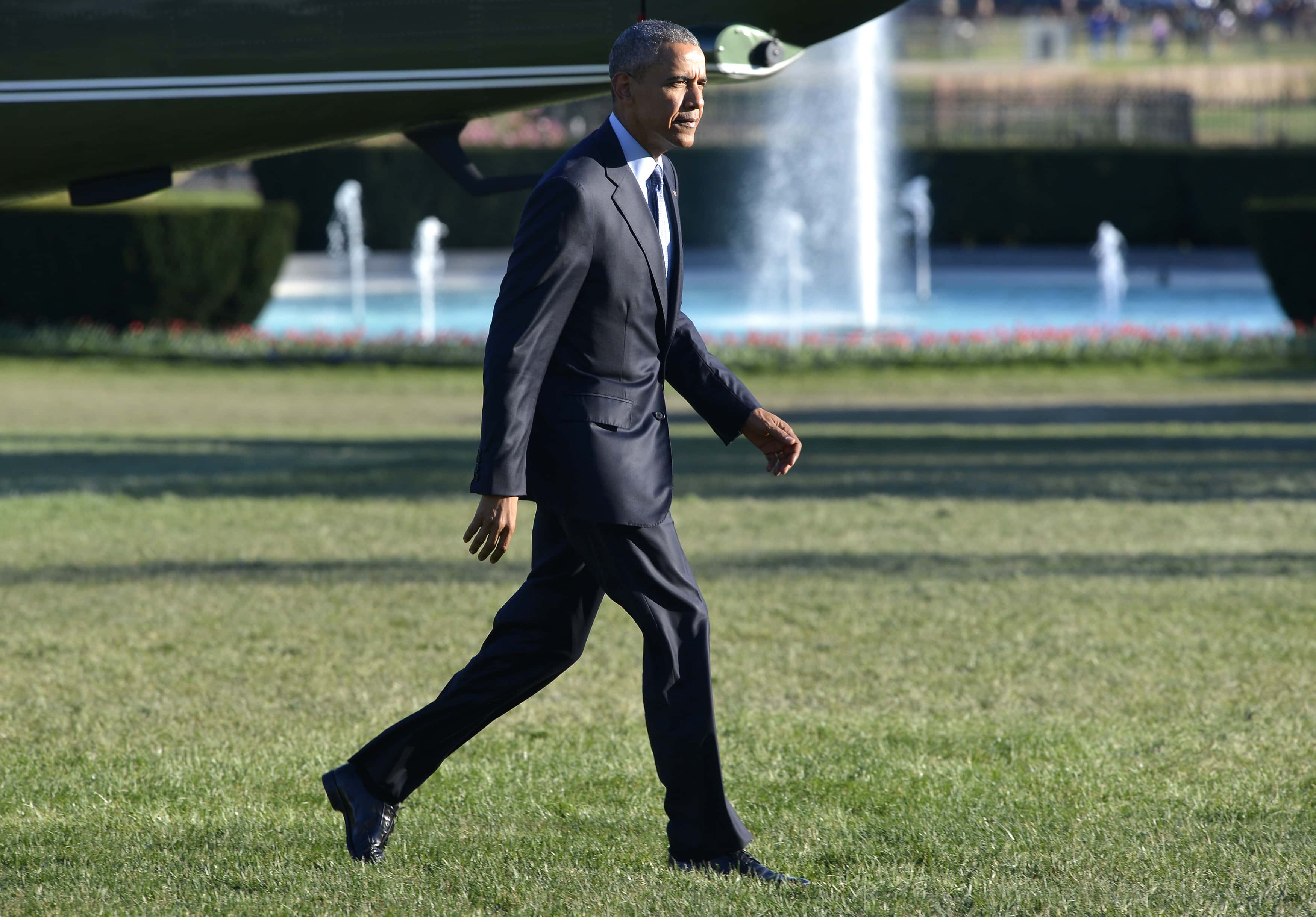 US President Obama returns to Washington from a day trip to Atlanta