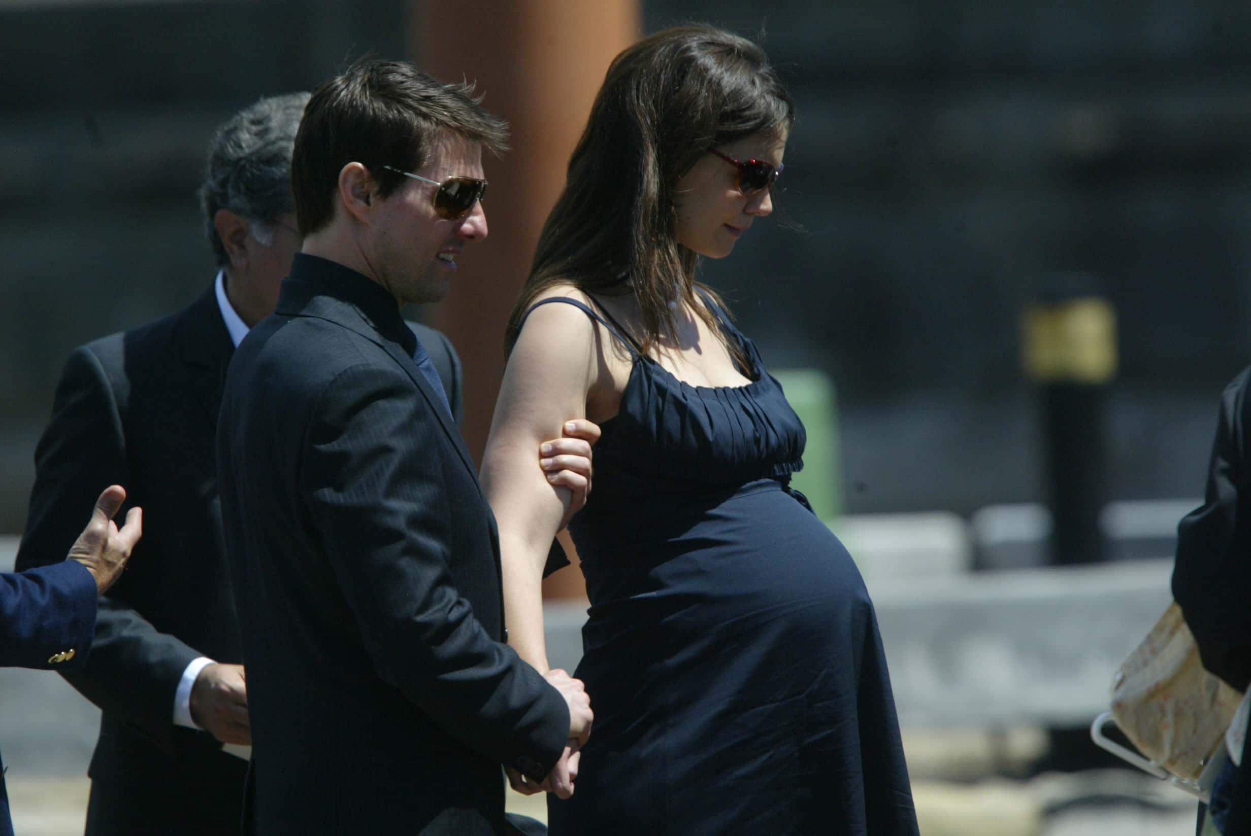 Tom Cruise and his pregnant fiancee Katie Holmes leave Kerry Packer's memorial service