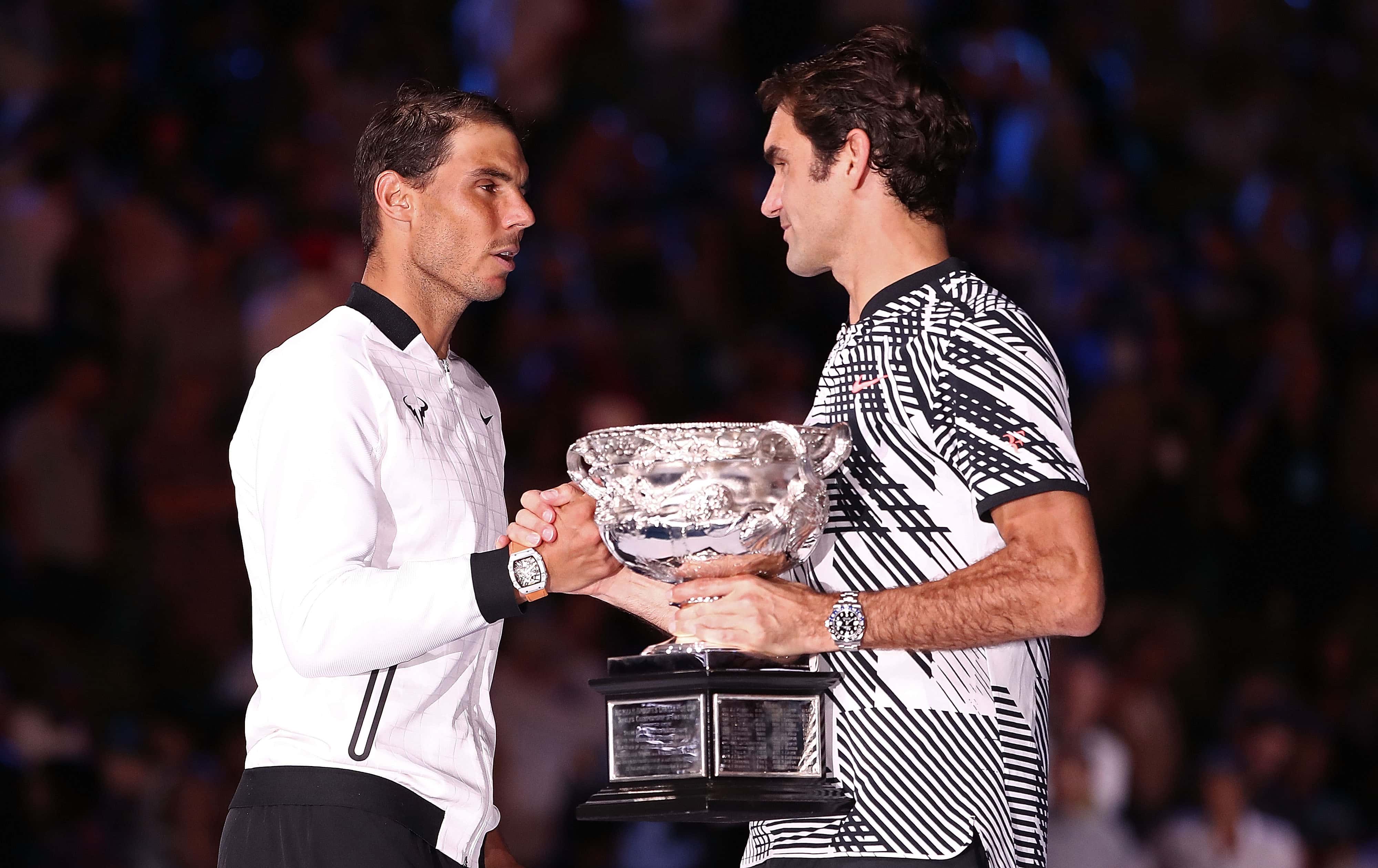 Rafael Nadal of Spain congratulates Roger Federer of Switzerland