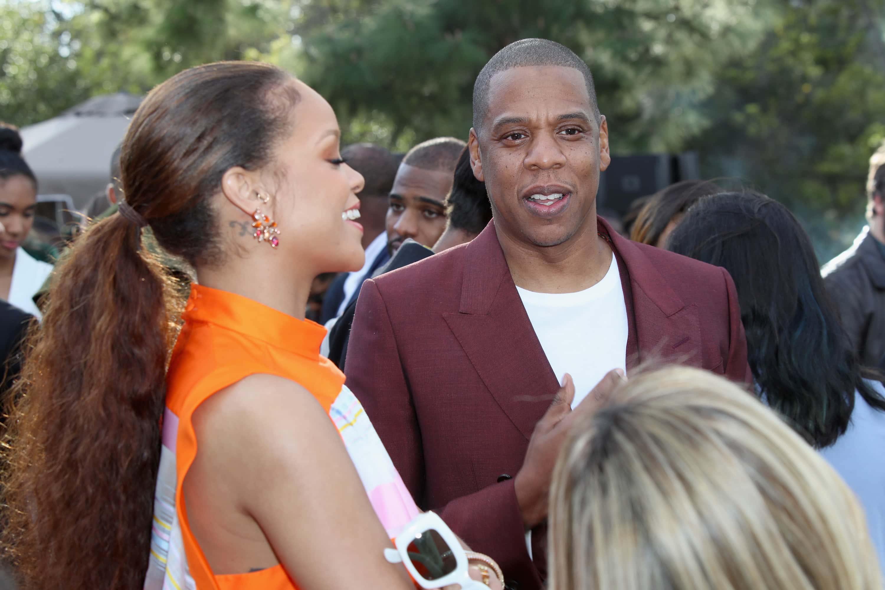 Singer Rihanna (L) and Jay-Z attend 2017 Roc Nation Pre-Grammy Brunch