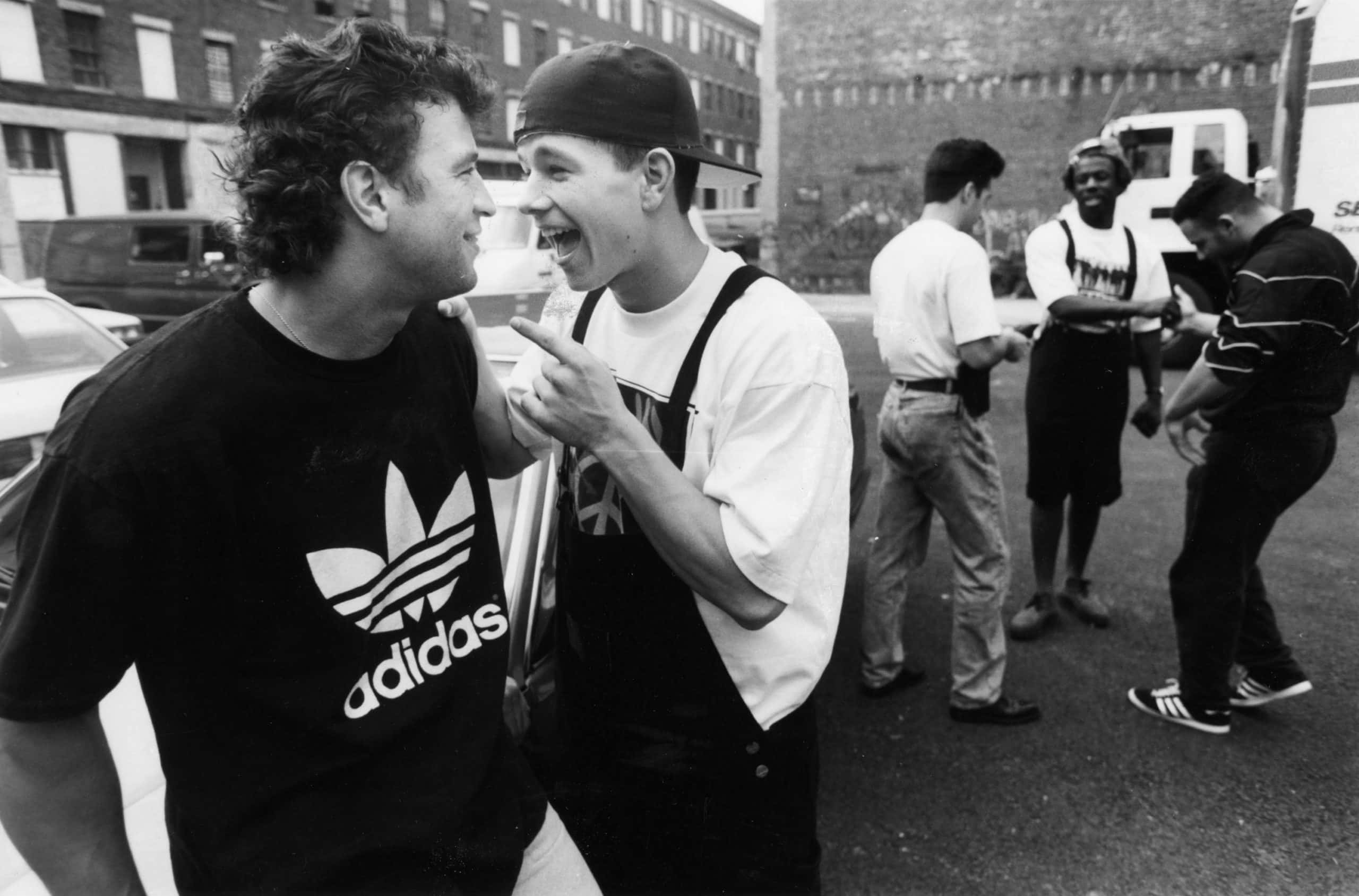 Mark Wahlberg, a rap artist known as Marky Mark, right, is pictured with his cousin and trainer John Michael Alves