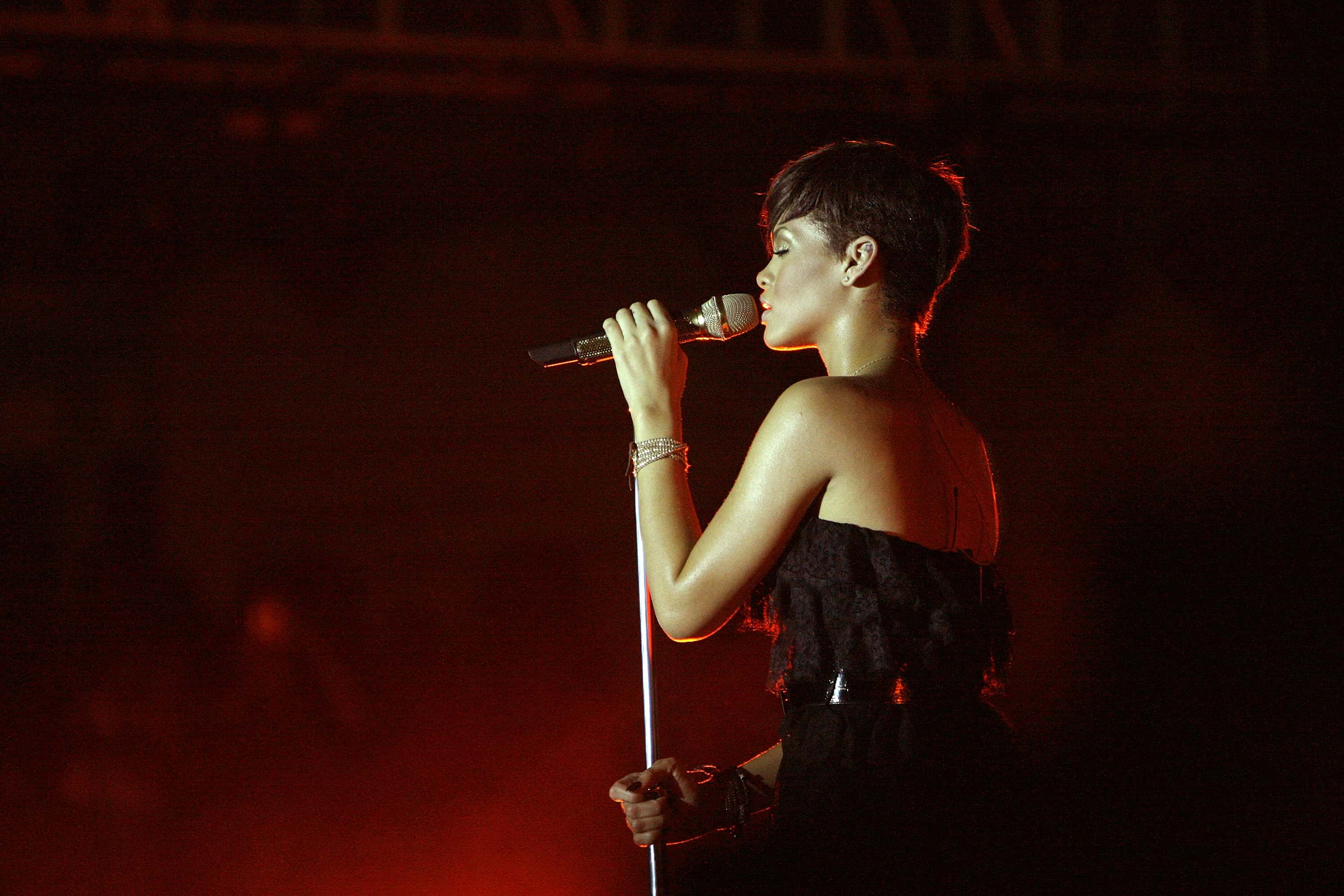 Rihanna performs during the 3rd This Day Africa Rising concert on July 11, 2008 in Abuja, Nigeria.