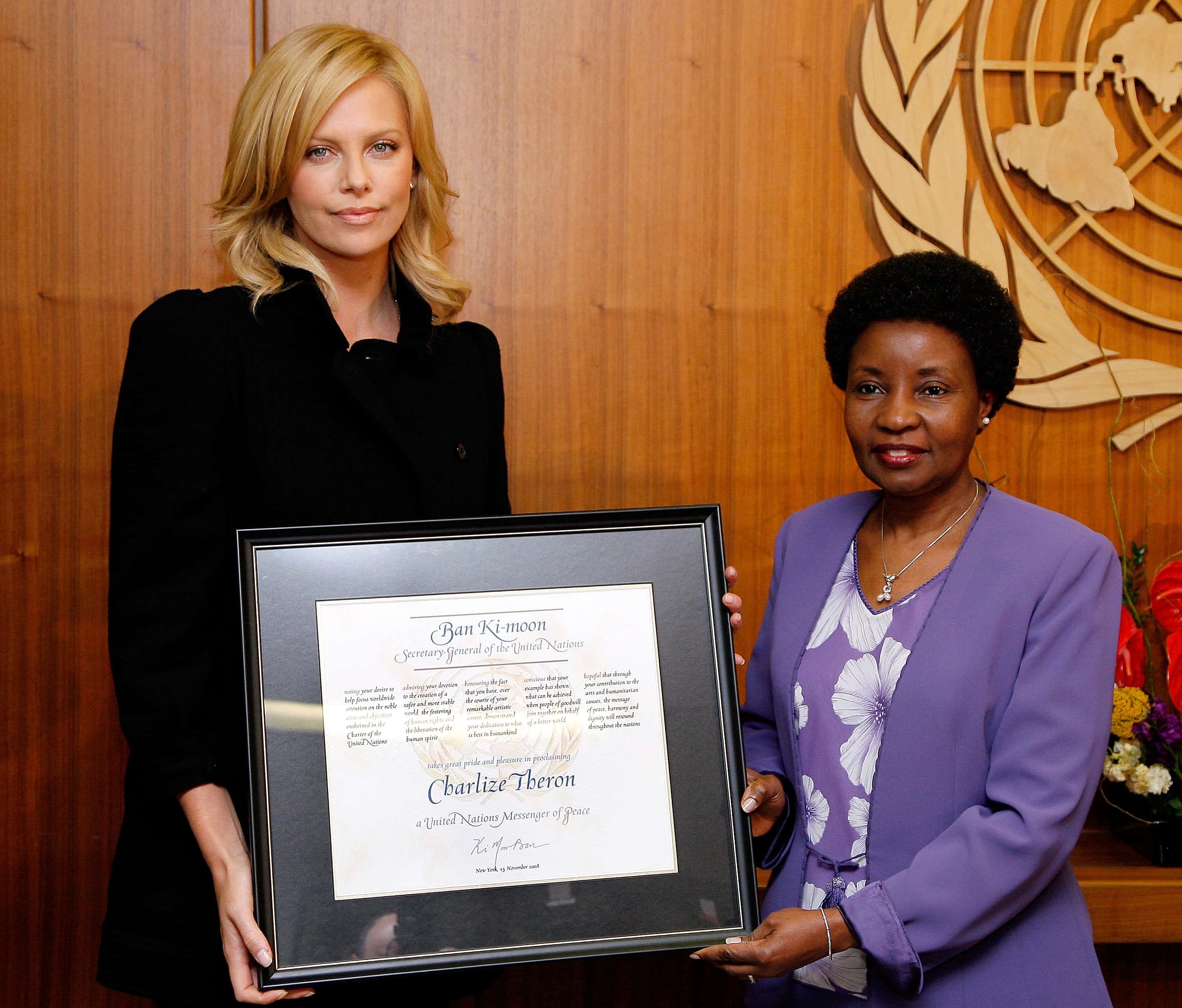 Charlize Theron is inducted as a UN Messenger of Peace at a UN Messenger of Peace induction ceremony - 2008