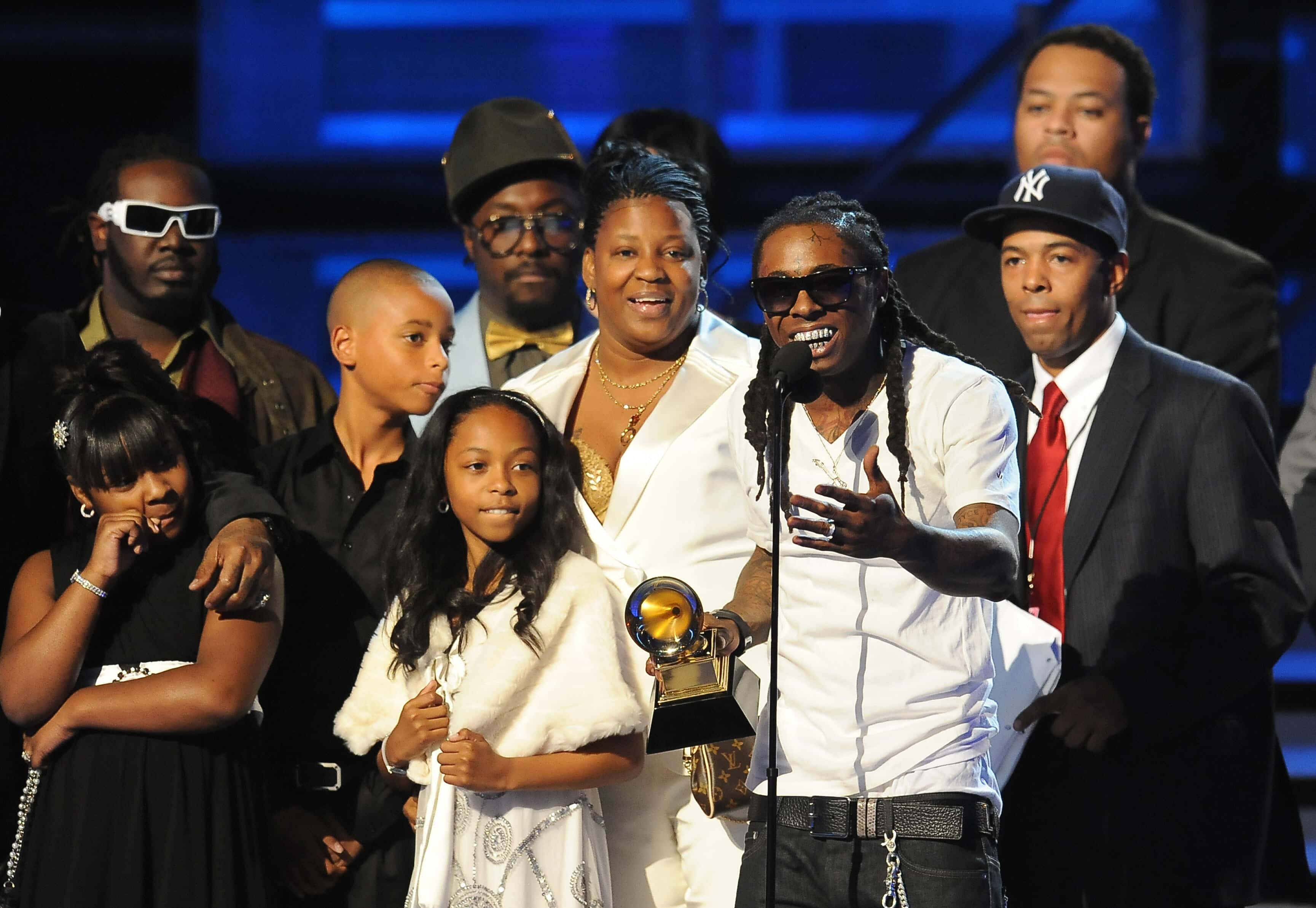 Rapper Lil Wayne accepts the Best Rap Solo Performance award