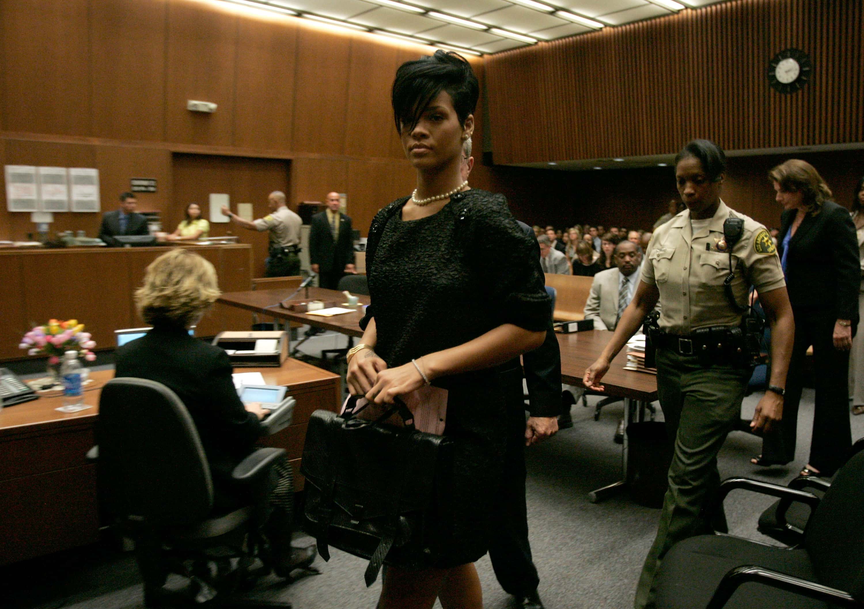 Singer Rihanna  walk out of a preliminary hearing