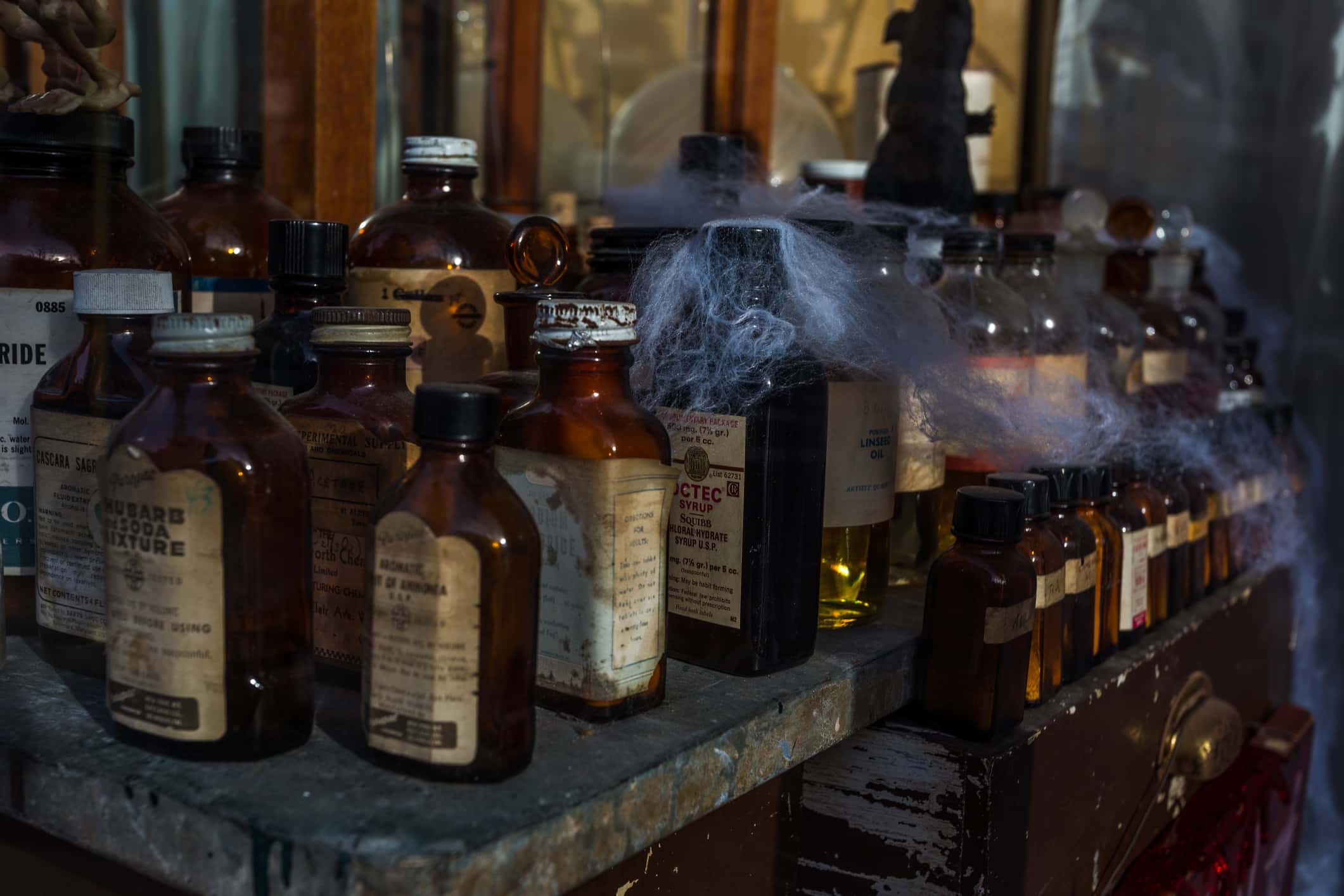 Display of old apothecary bottles
