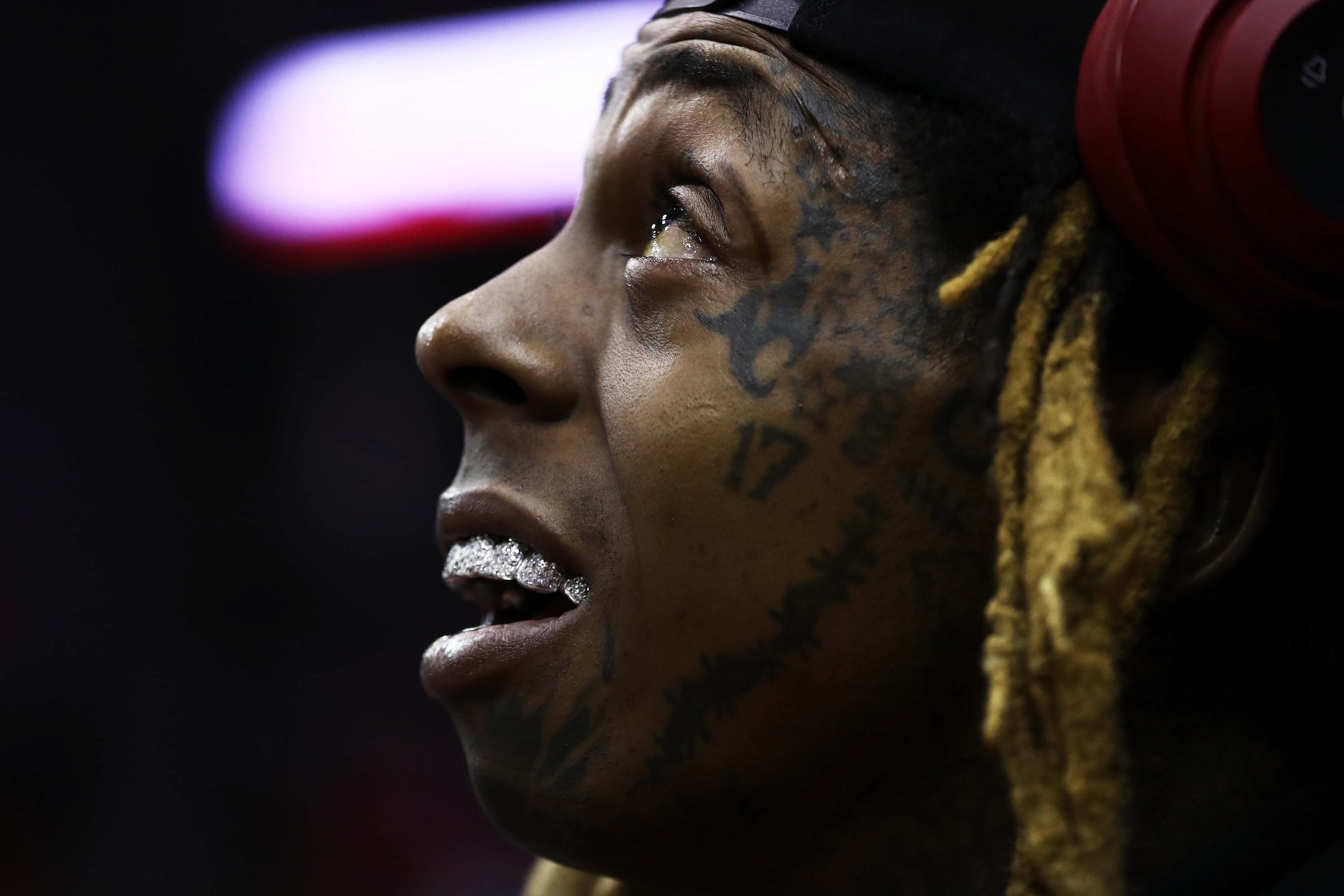 Lil Wayne attends Game Seven of the Western Conference Finals