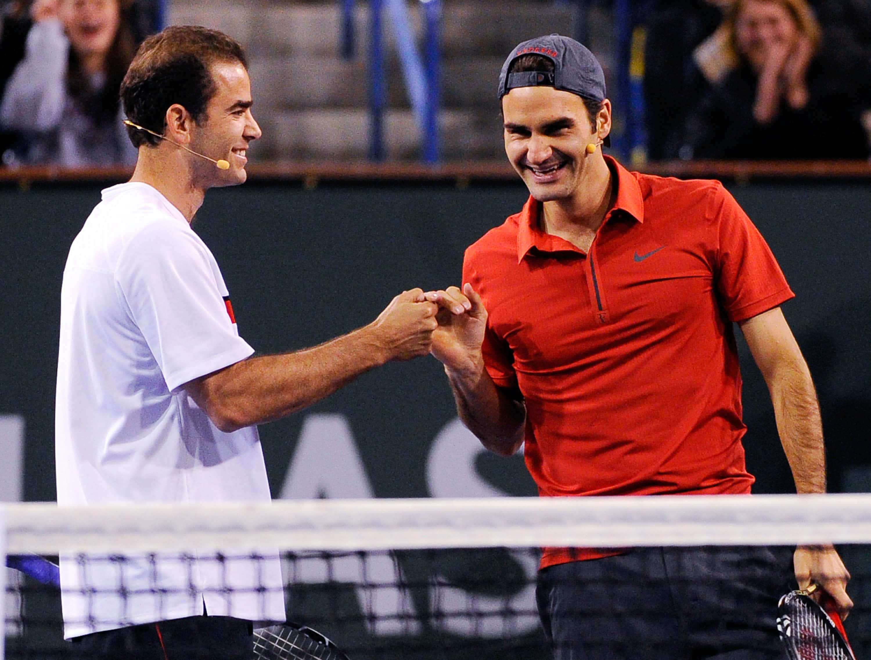 Former tennis player Pete Sampras and Roger Federer of Switzerland,during Hit for Haiti