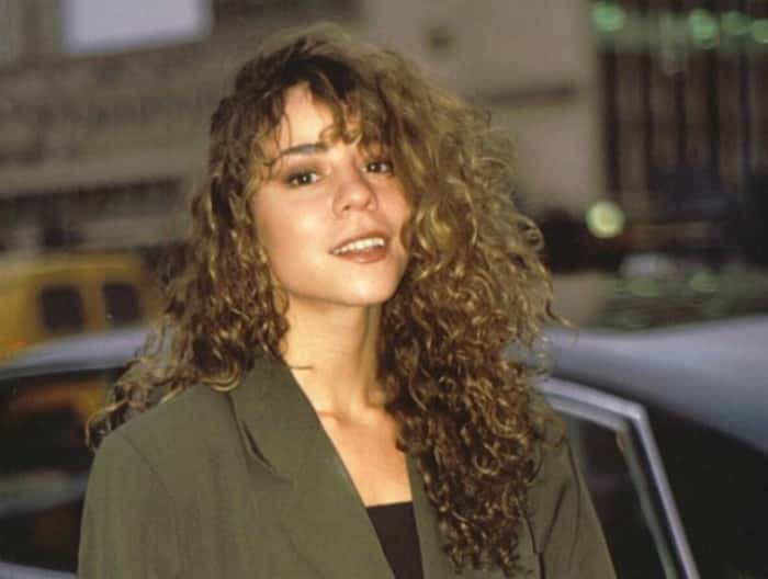 Mariah Carey wearing a grey jacket at the Shepherd's Bush Theatre