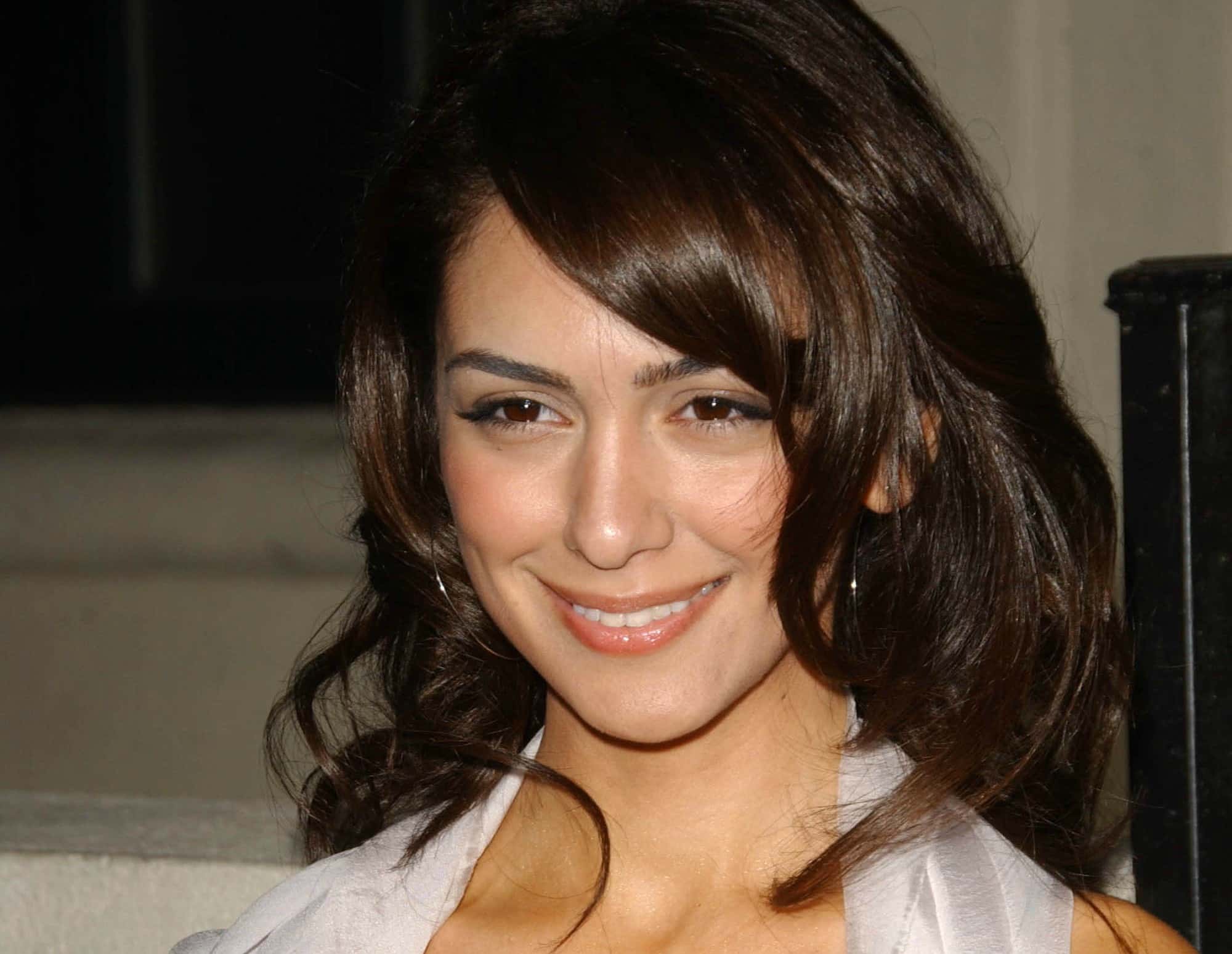 Nazanin Boniadi wearing pink scarf