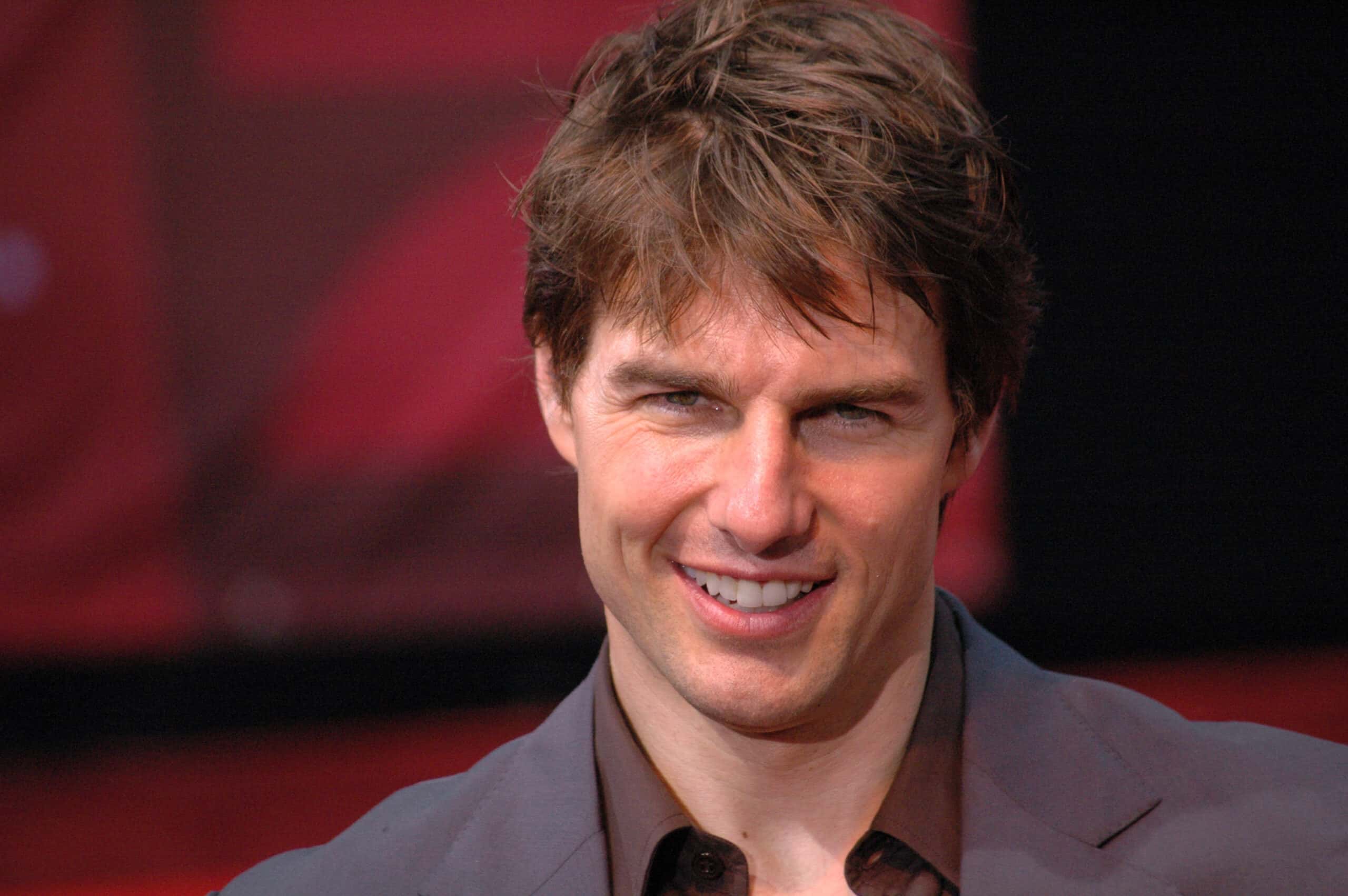 Tom Cruise looks into the camera