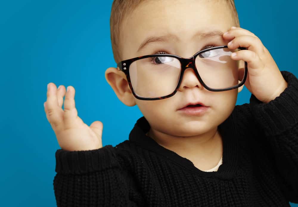 Photo of a baby with glasses